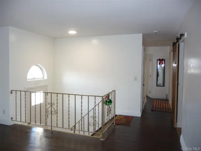 a bathroom with a toilet a sink and shower