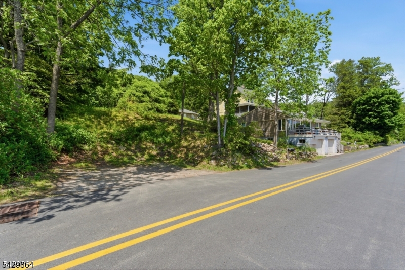 77 Lower North Shore Road Branchville, NJ 07826 - Photo 30 of 38 a view of a road with a building in the background