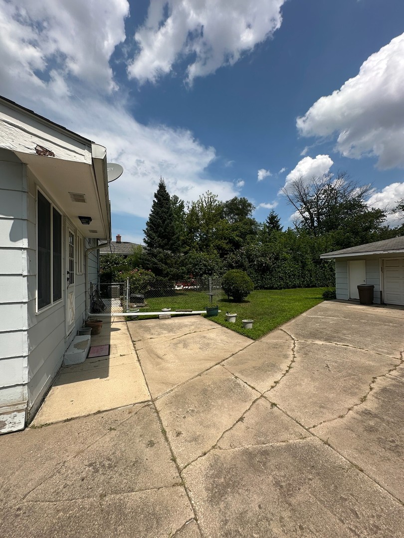 17871 Locust Street Lansing, IL 60438 - Photo 22 of 25 a view of a house with entertaining space