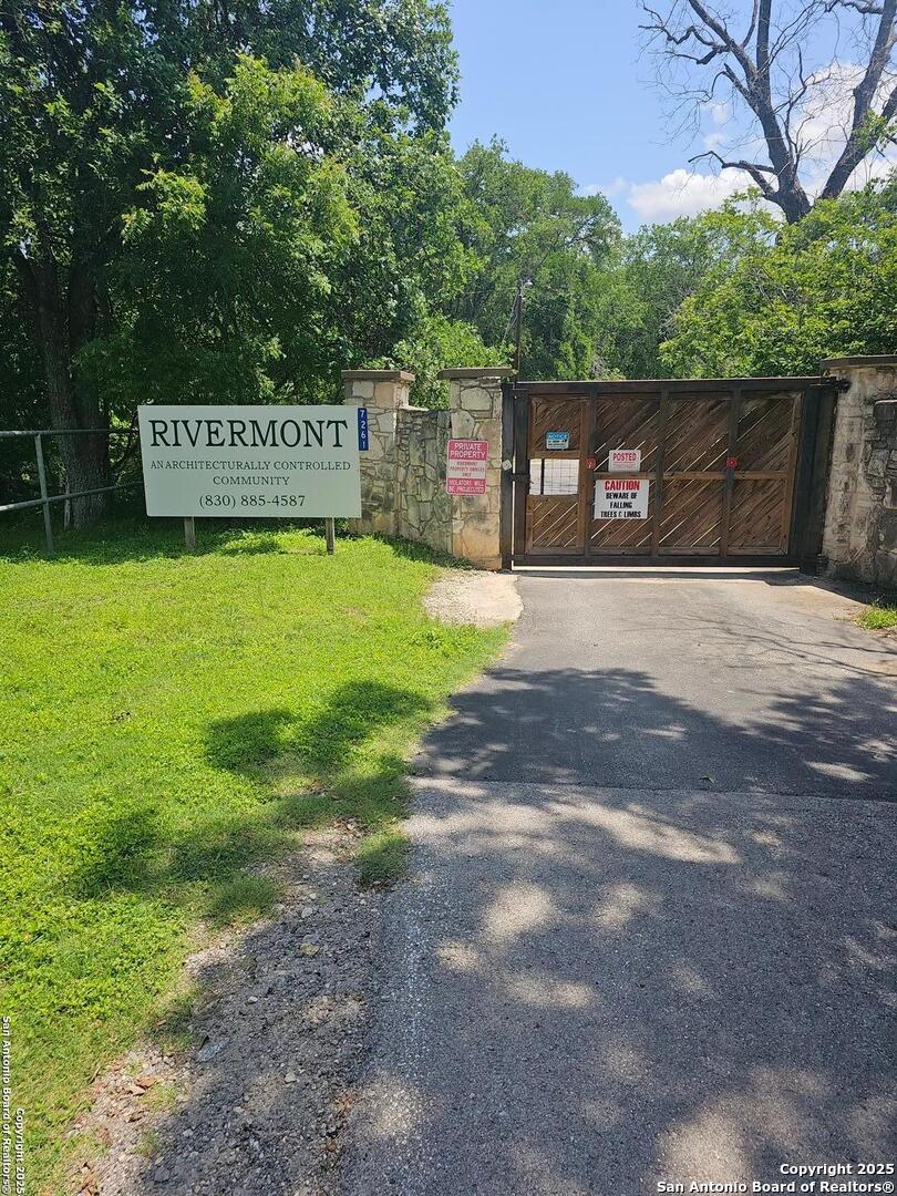 5250 Spring Branch Spring Branch, TX 78070 - Photo 3 of 11 a view of a park with trees and a sign board
