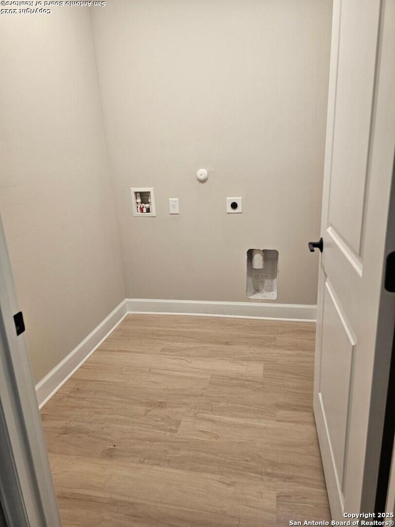 5250 Spring Branch Spring Branch, TX 78070 - Photo 4 of 23 a view of a room with wooden floor