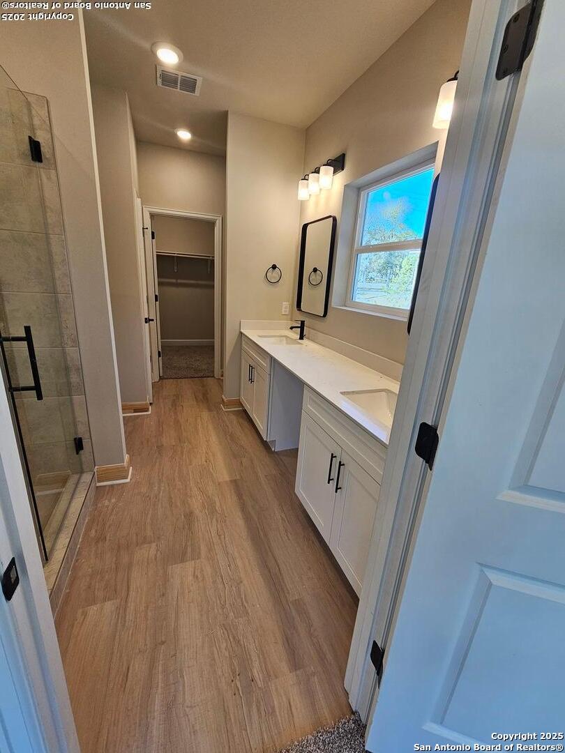 5250 Spring Branch Spring Branch, TX 78070 - Photo 9 of 23 a large kitchen with a sink a refrigerator and a stove