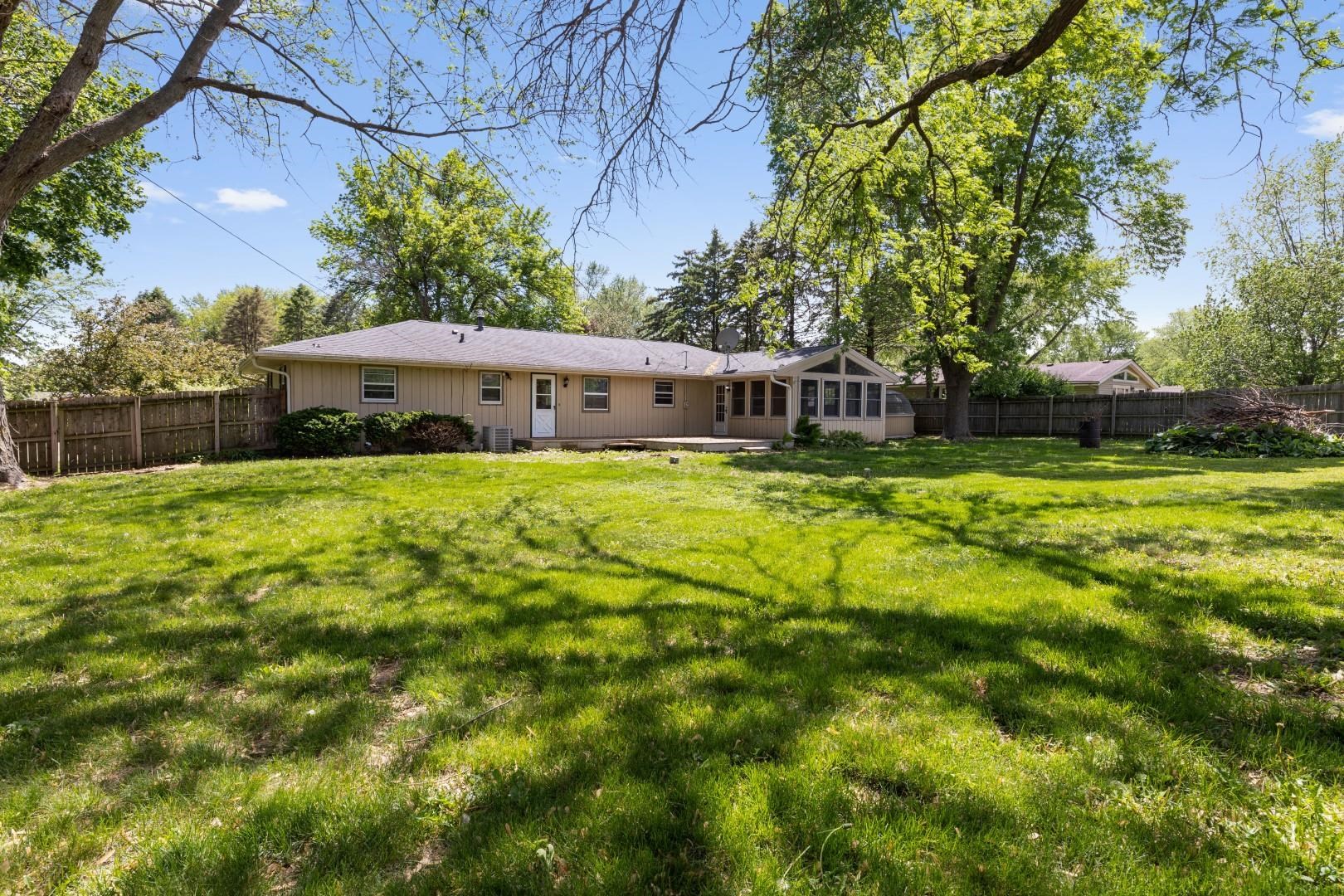 5864 Dover Road Rockford, IL 61109 - Photo 32 of 33 a view of a house with swimming pool and sitting area