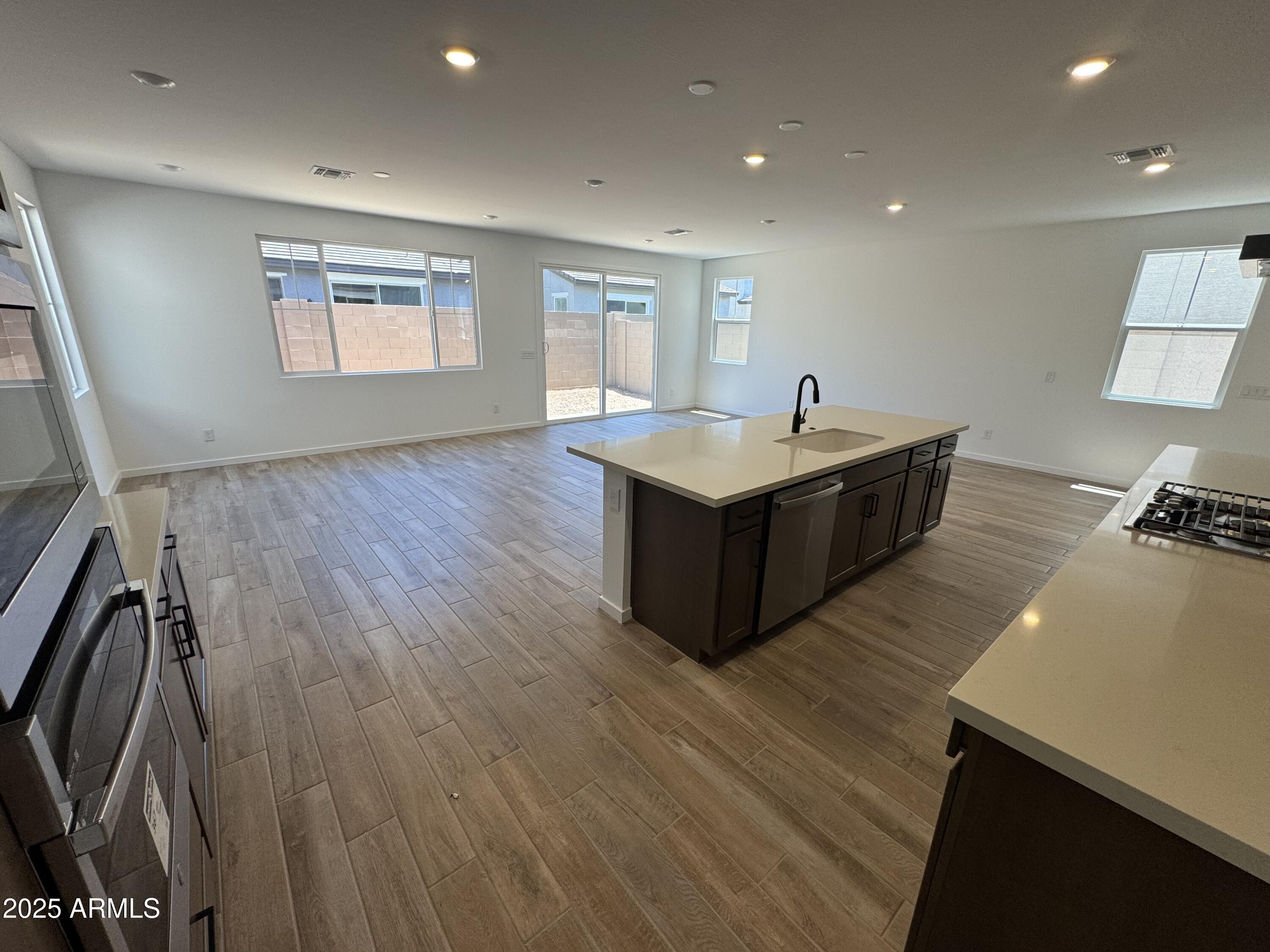 2478 West Rowel Road Phoenix, AZ 85085 - Photo 5 of 24 Kitchen and great room view