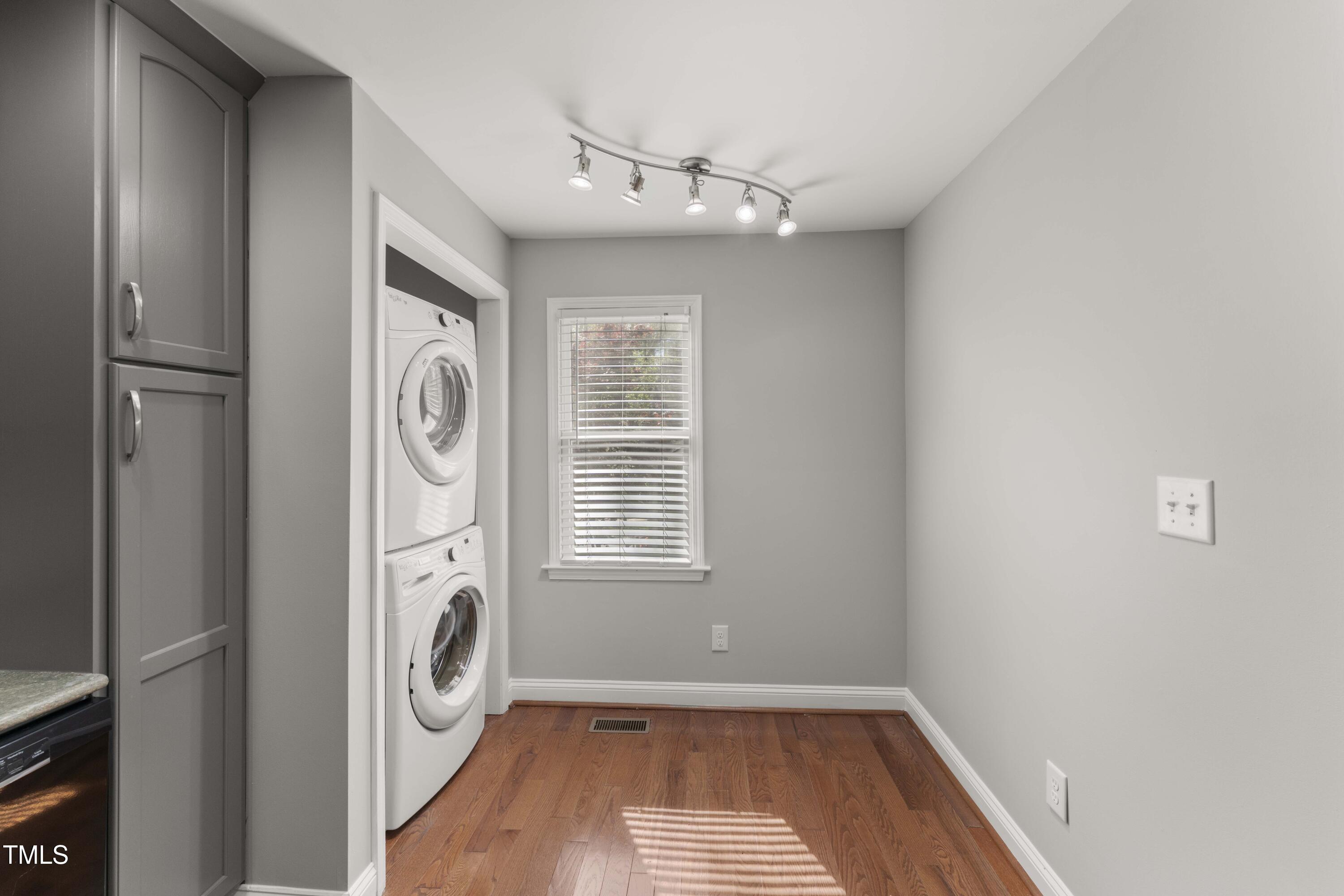 1426 Quarter Point Raleigh, NC 27615 - Photo 15 of 64 a view of a hallway with washer and dryer
