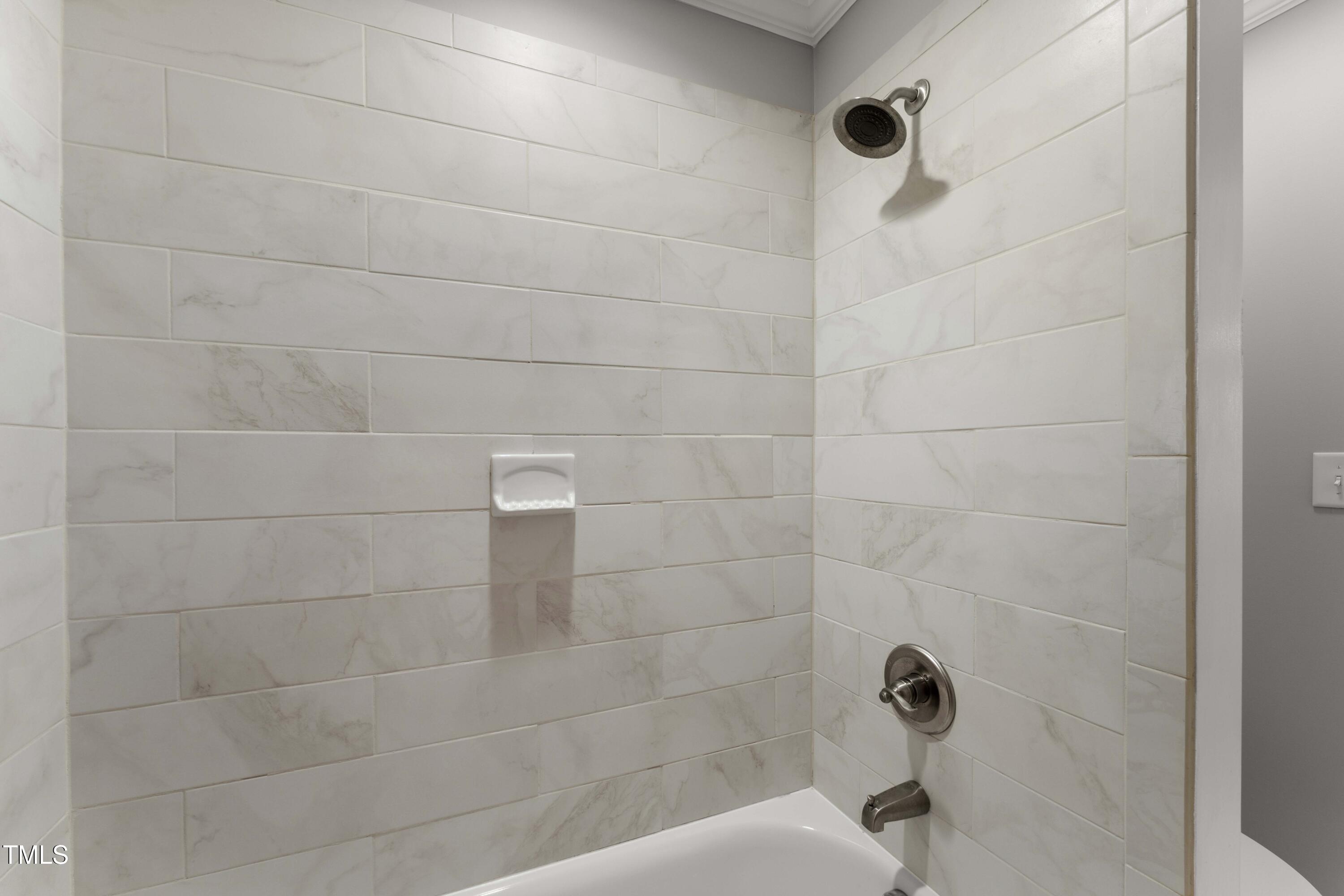 1426 Quarter Point Raleigh, NC 27615 - Photo 38 of 64 a bathroom with a shower