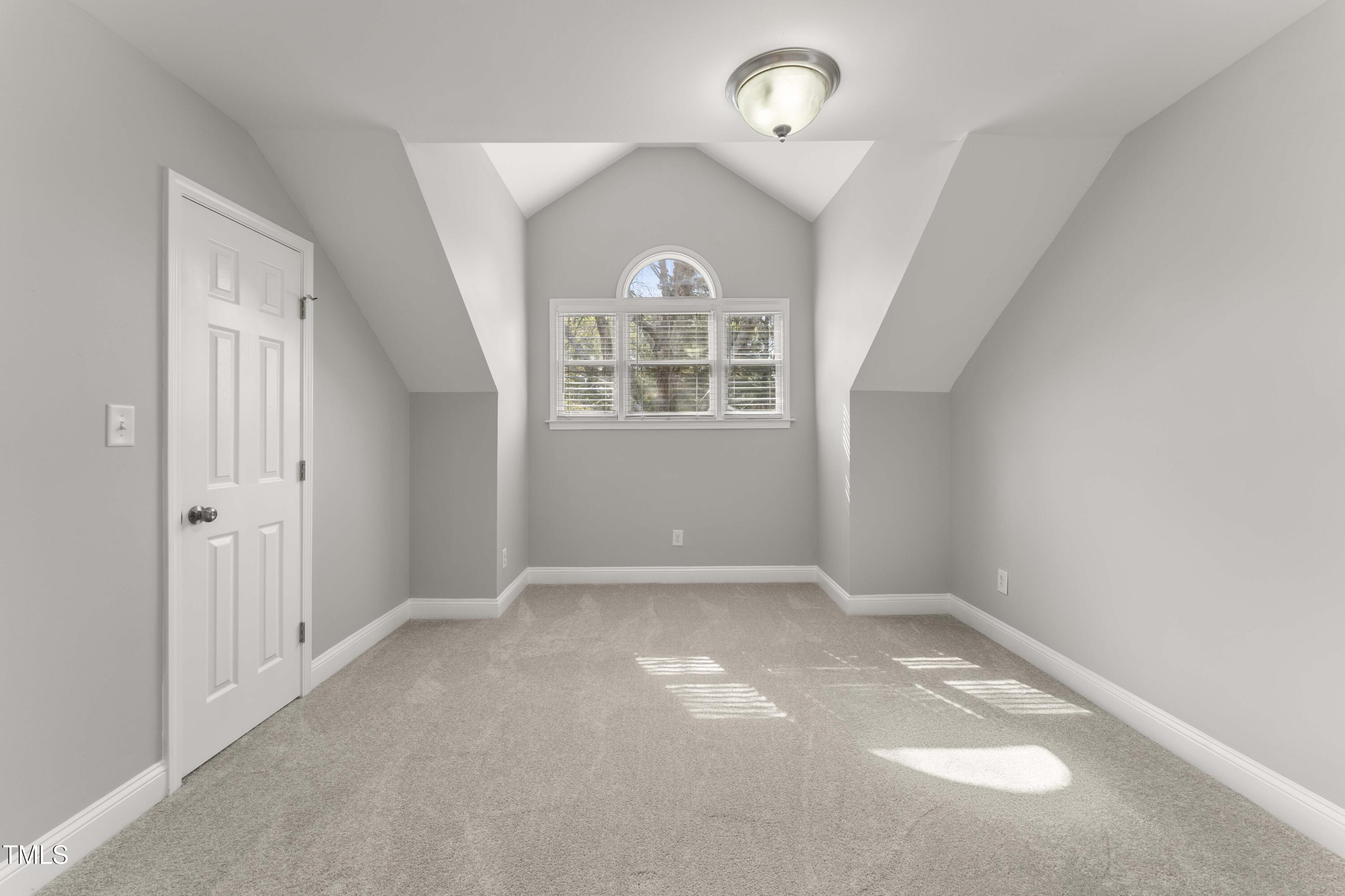 1426 Quarter Point Raleigh, NC 27615 - Photo 39 of 64 an empty room with windows and entrance