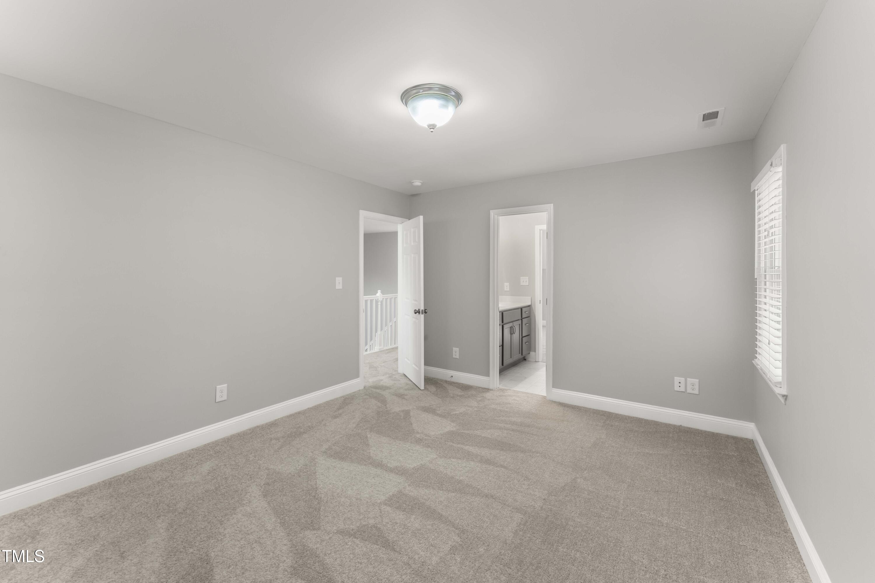 1426 Quarter Point Raleigh, NC 27615 - Photo 44 of 64 a view of an empty room