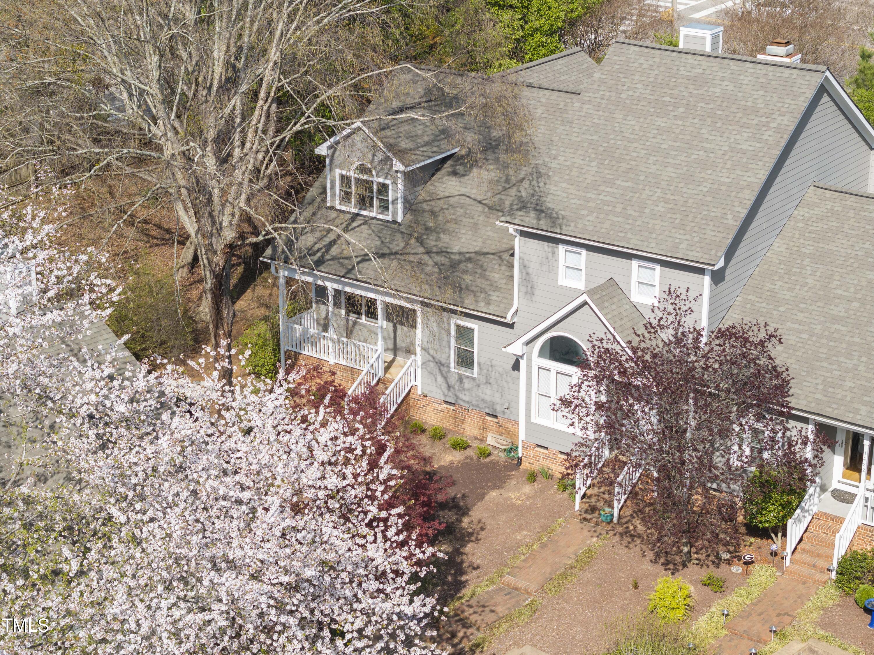 1426 Quarter Point Raleigh, NC 27615 - Photo 62 of 64 front view of a house with a yard
