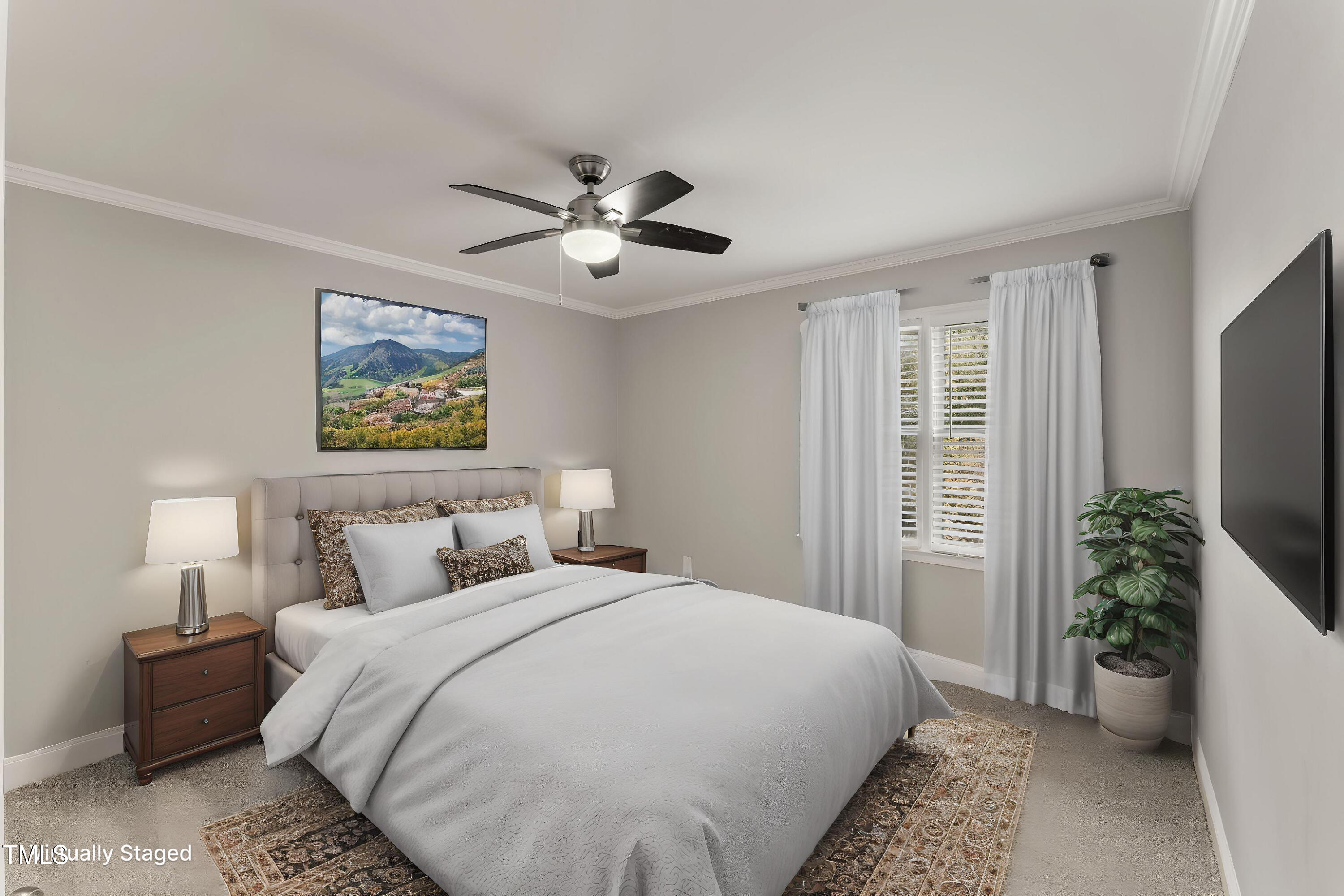 1426 Quarter Point Raleigh, NC 27615 - Photo 6 of 64 a bedroom with a bed and a chandelier