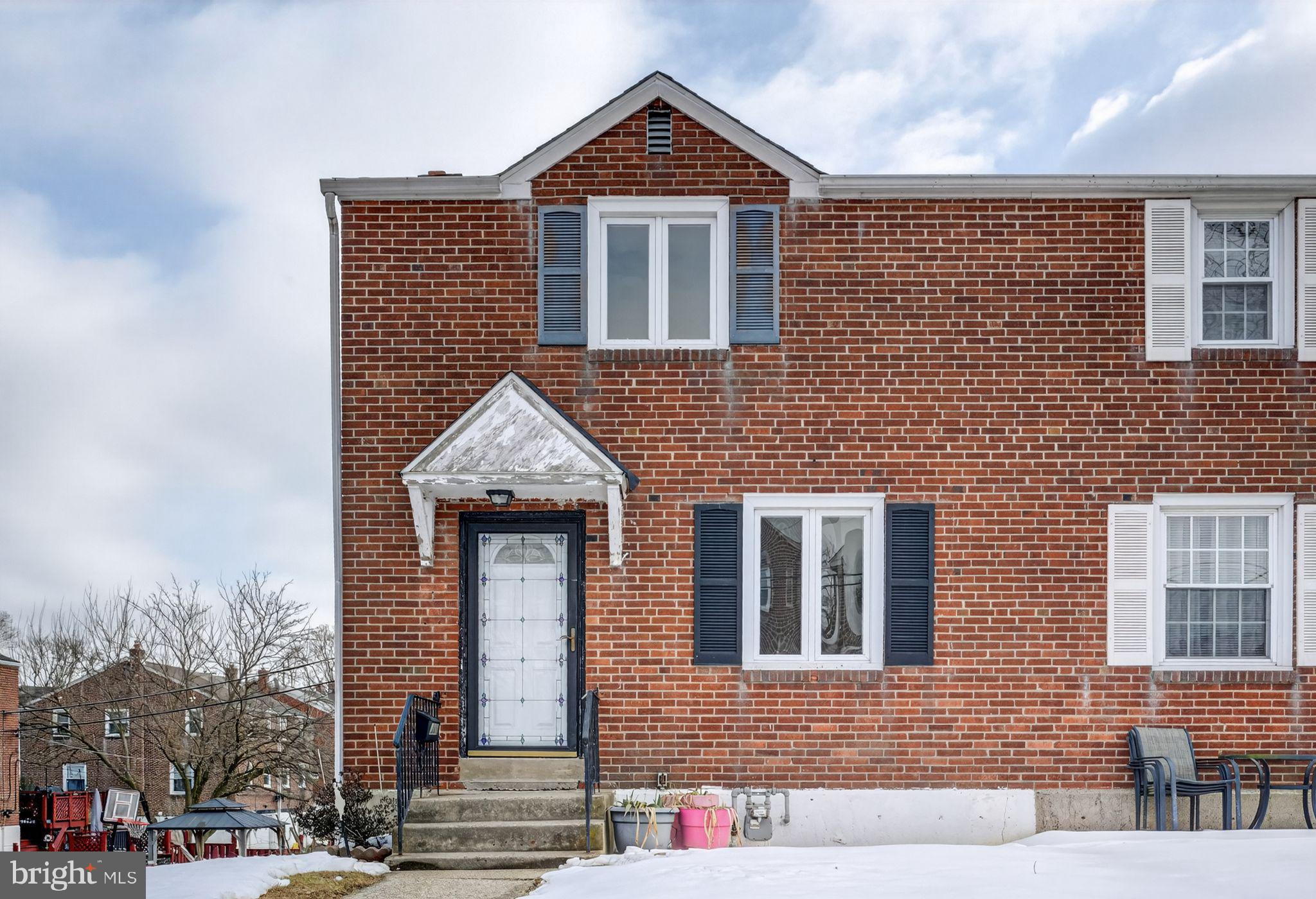 1311 Spring Street Sharon Hill, PA 19079 - Photo 1 of 21 a front view of a house with street