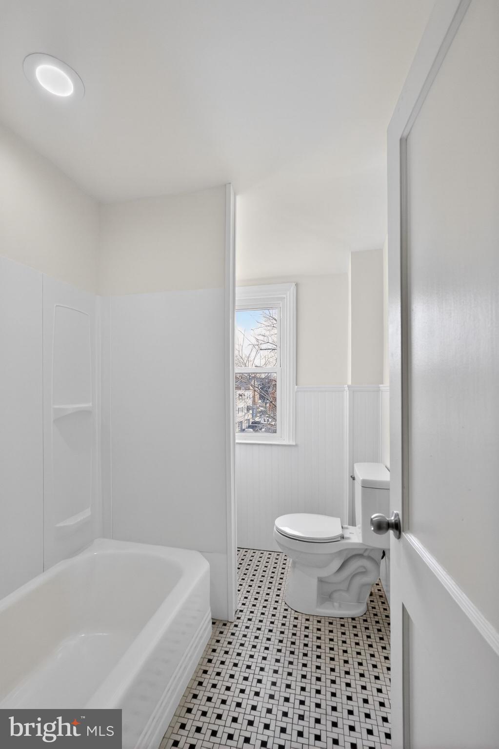 1311 Spring Street Sharon Hill, PA 19079 - Photo 11 of 21 a bathroom with a bathtub and toilet
