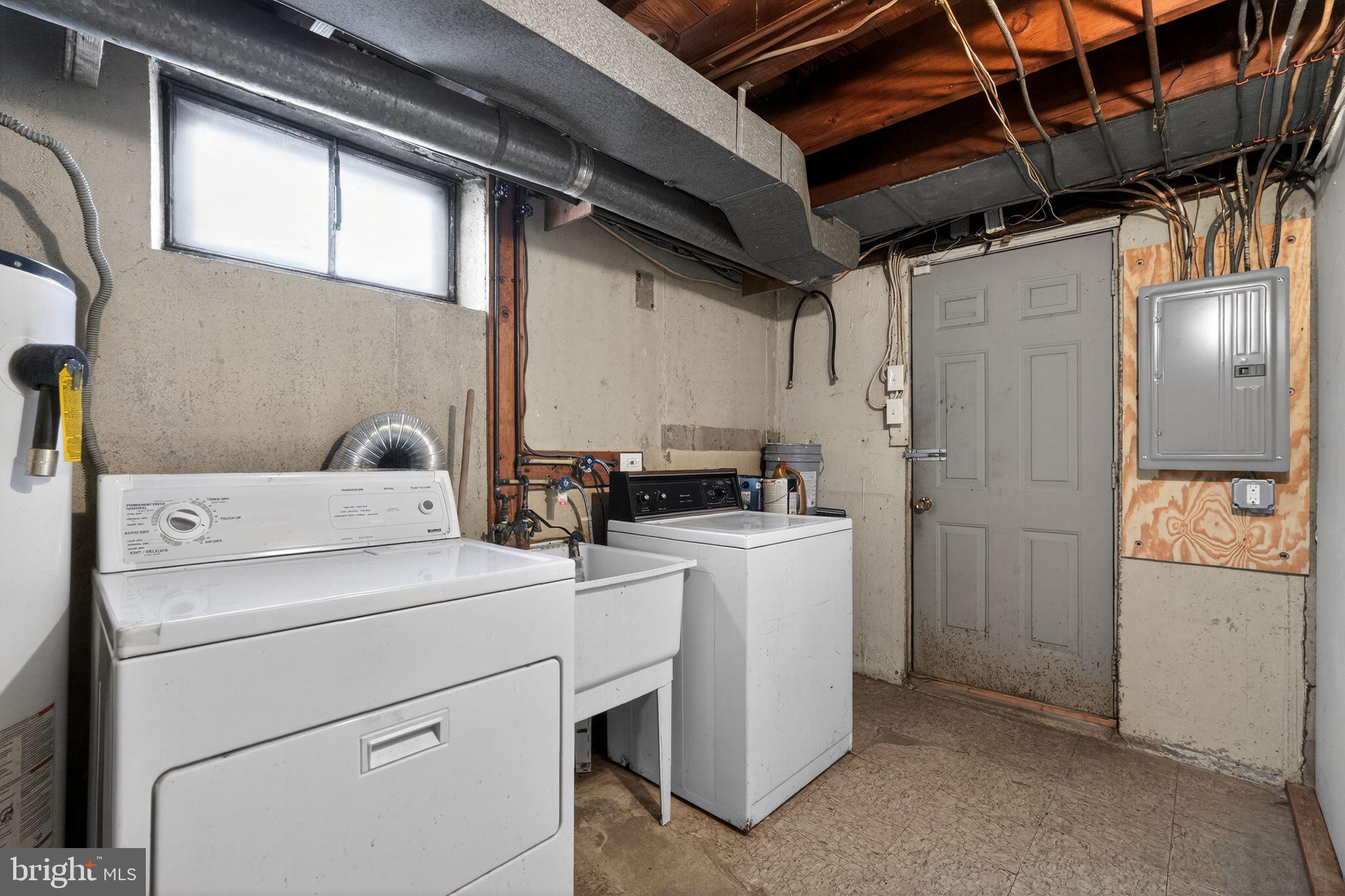 1311 Spring Street Sharon Hill, PA 19079 - Photo 16 of 21 a utility room with dryer and washer
