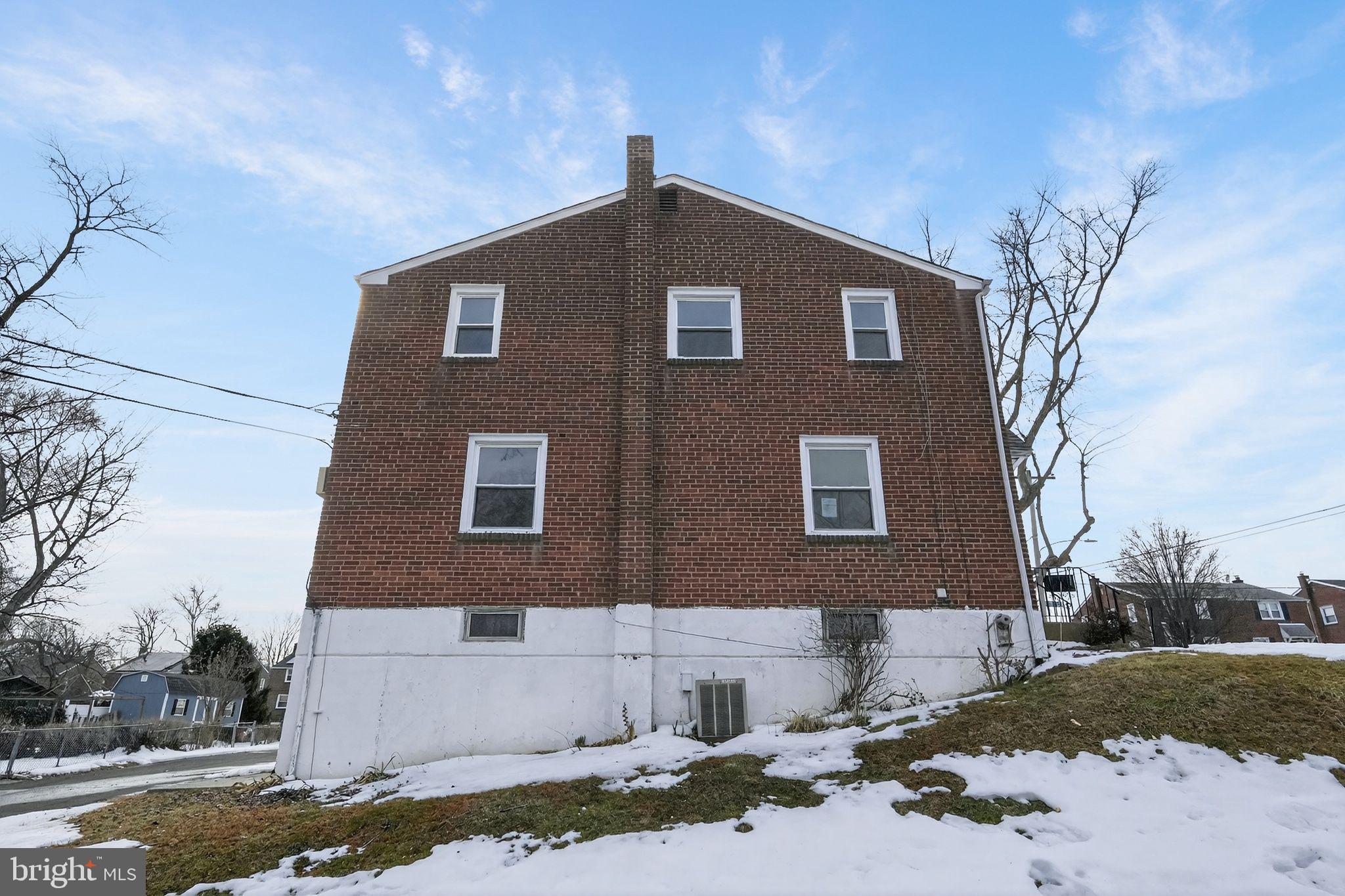 1311 Spring Street Sharon Hill, PA 19079 - Photo 20 of 21 a front view of a house with a yard
