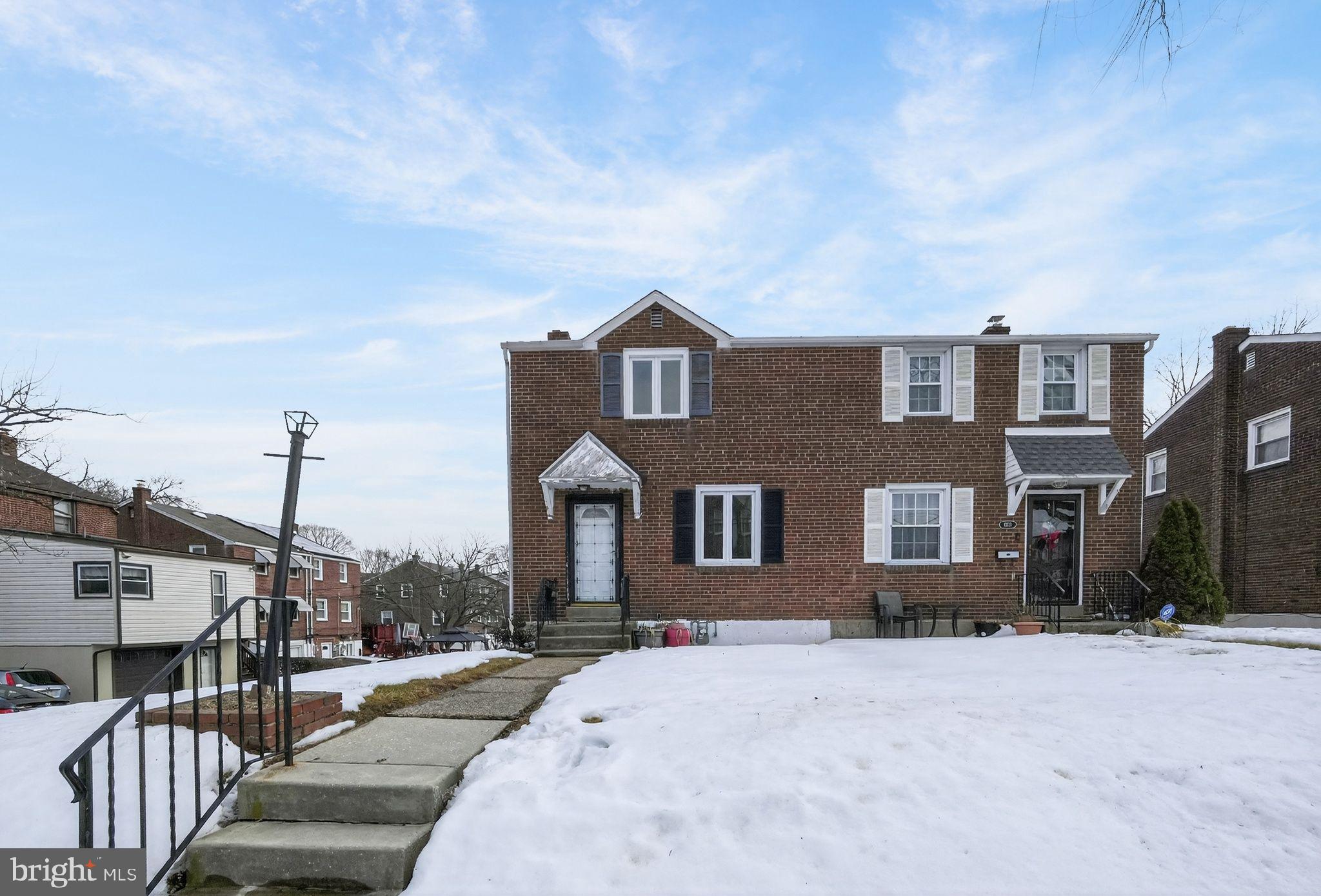 1311 Spring Street Sharon Hill, PA 19079 - Photo 2 of 21 a front view of a house with a yard