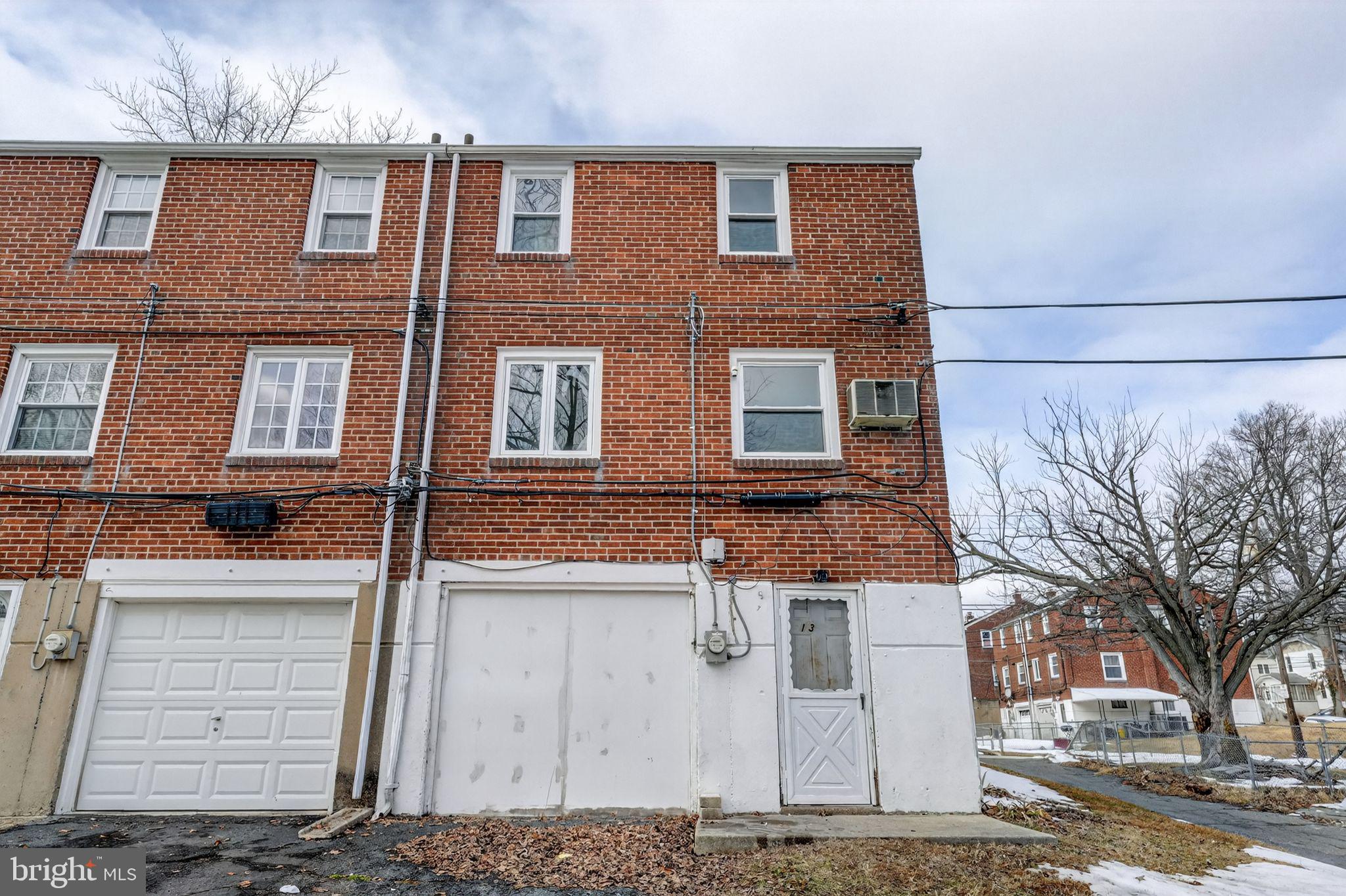 1311 Spring Street Sharon Hill, PA 19079 - Photo 21 of 21 a front view of a house with a yard