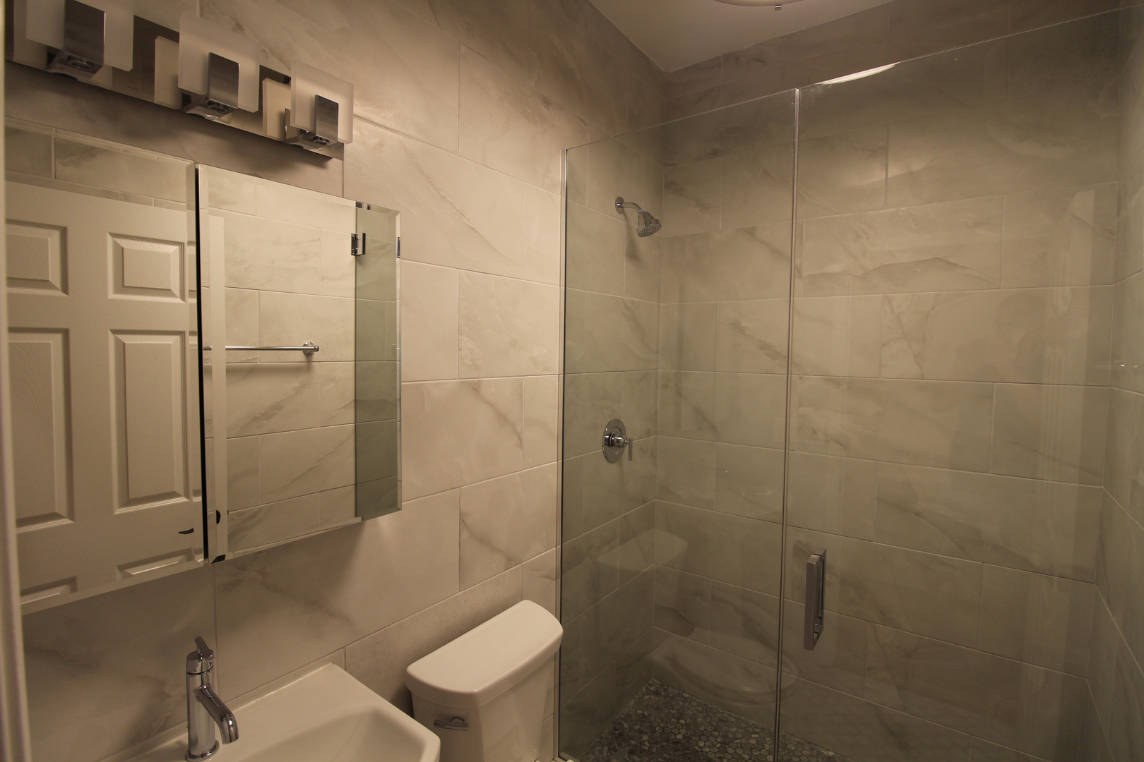2054 West Division Street, Unit 3 Chicago, IL 60622 - Photo 9 of 15 a bathroom with a shower and toilet