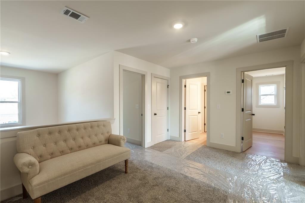 222 Good Hope Preserve Good Hope, GA 30641 - Photo 34 of 46 a living room with furniture and a walk in closet