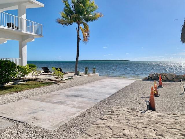 918 South Ruby Drive Key Largo, FL 33037 - Photo 45 of 57 a view of a terrace with chairs