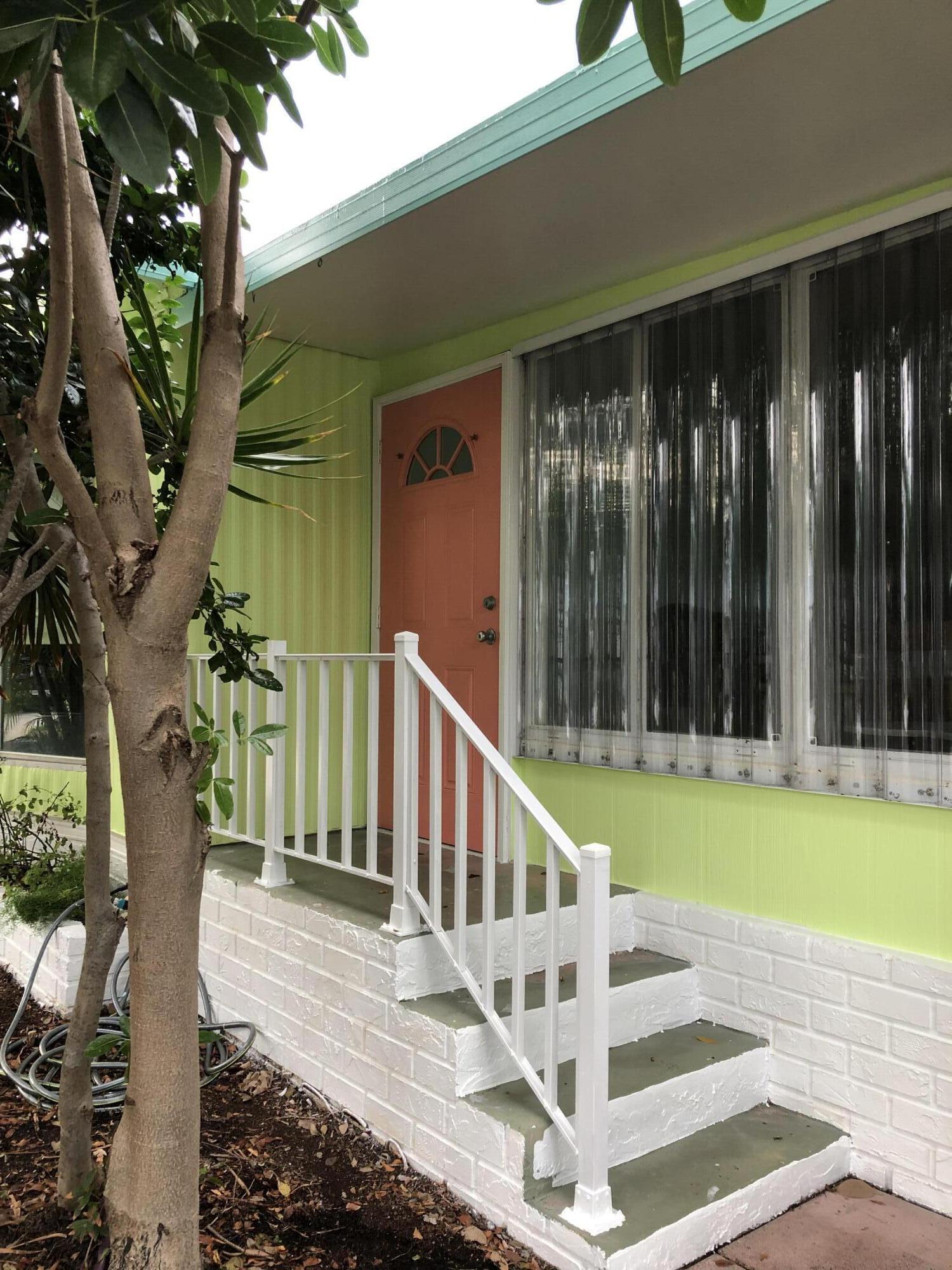 918 South Ruby Drive Key Largo, FL 33037 - Photo 6 of 57 CLEAR HURRICANE SHUTTERS ON SUN RROM