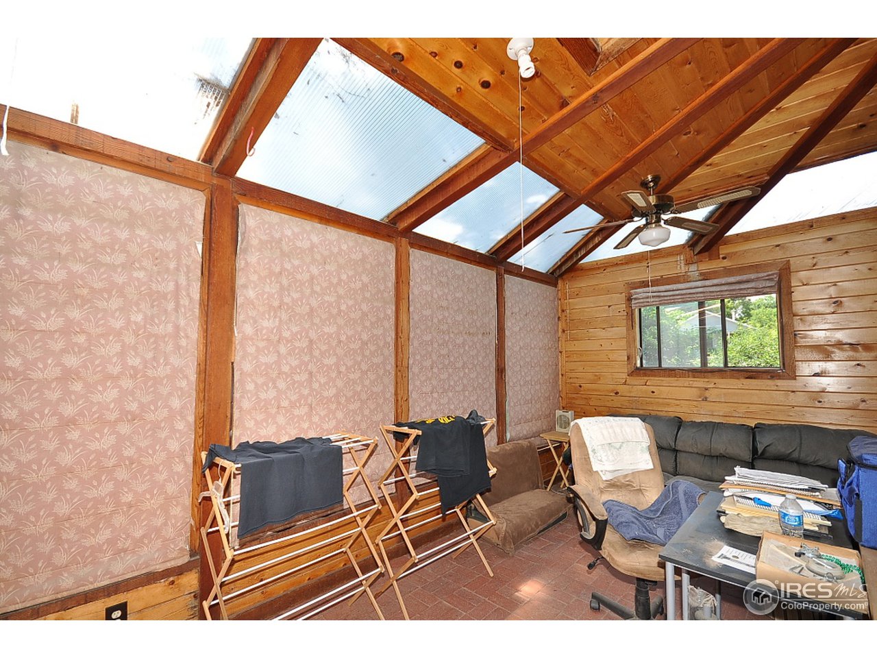 222 North Whitcomb Street Fort Collins, CO 80521 - Photo 12 of 23 a outdoor living space with furniture and fireplace