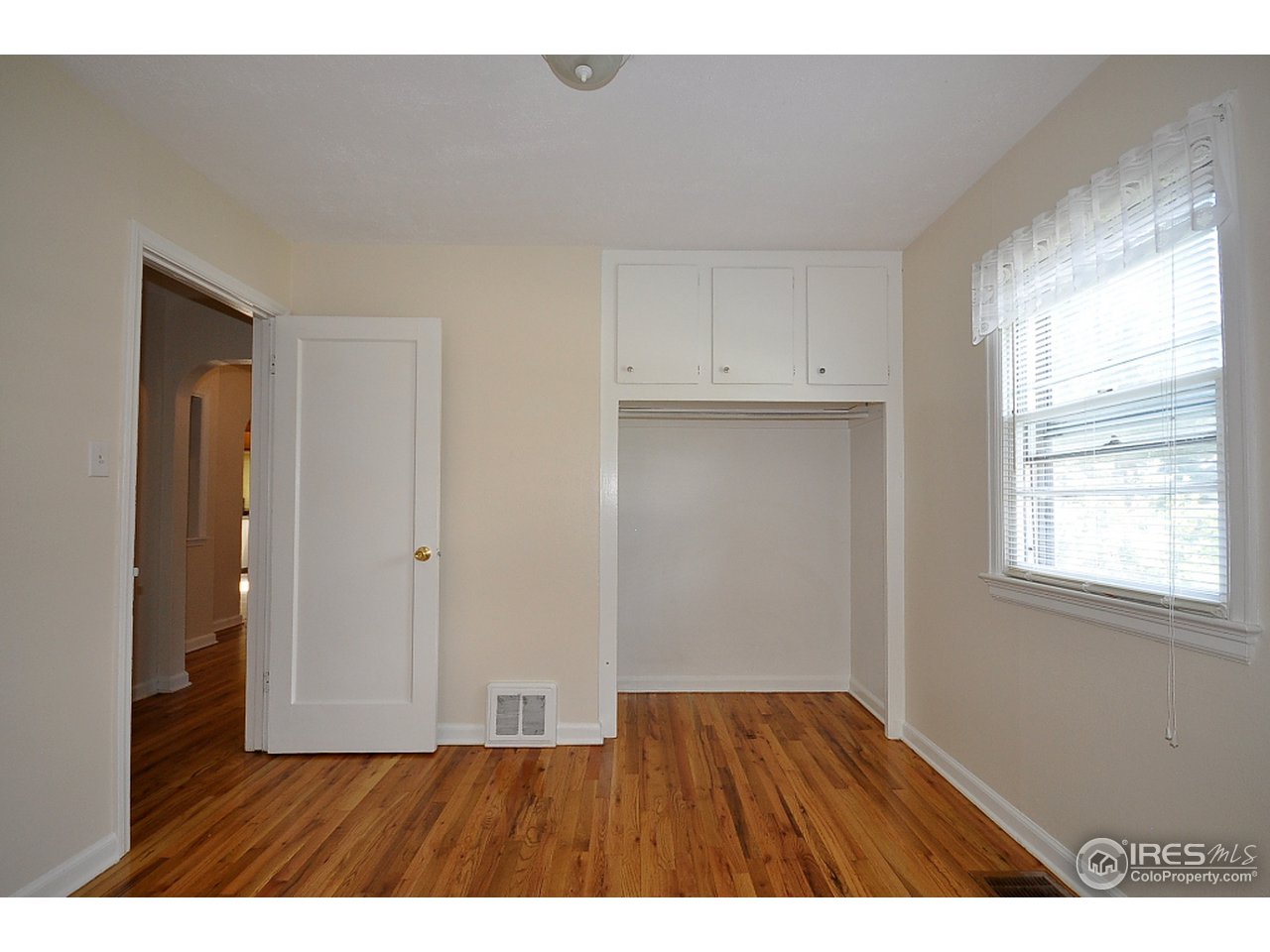 222 North Whitcomb Street Fort Collins, CO 80521 - Photo 16 of 23 a view of an empty room with a window