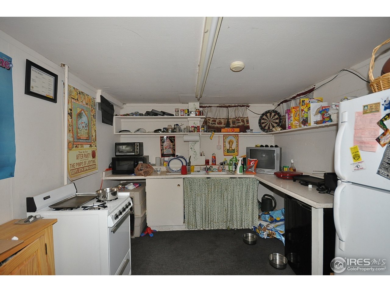 222 North Whitcomb Street Fort Collins, CO 80521 - Photo 20 of 23 a room with storage and utility