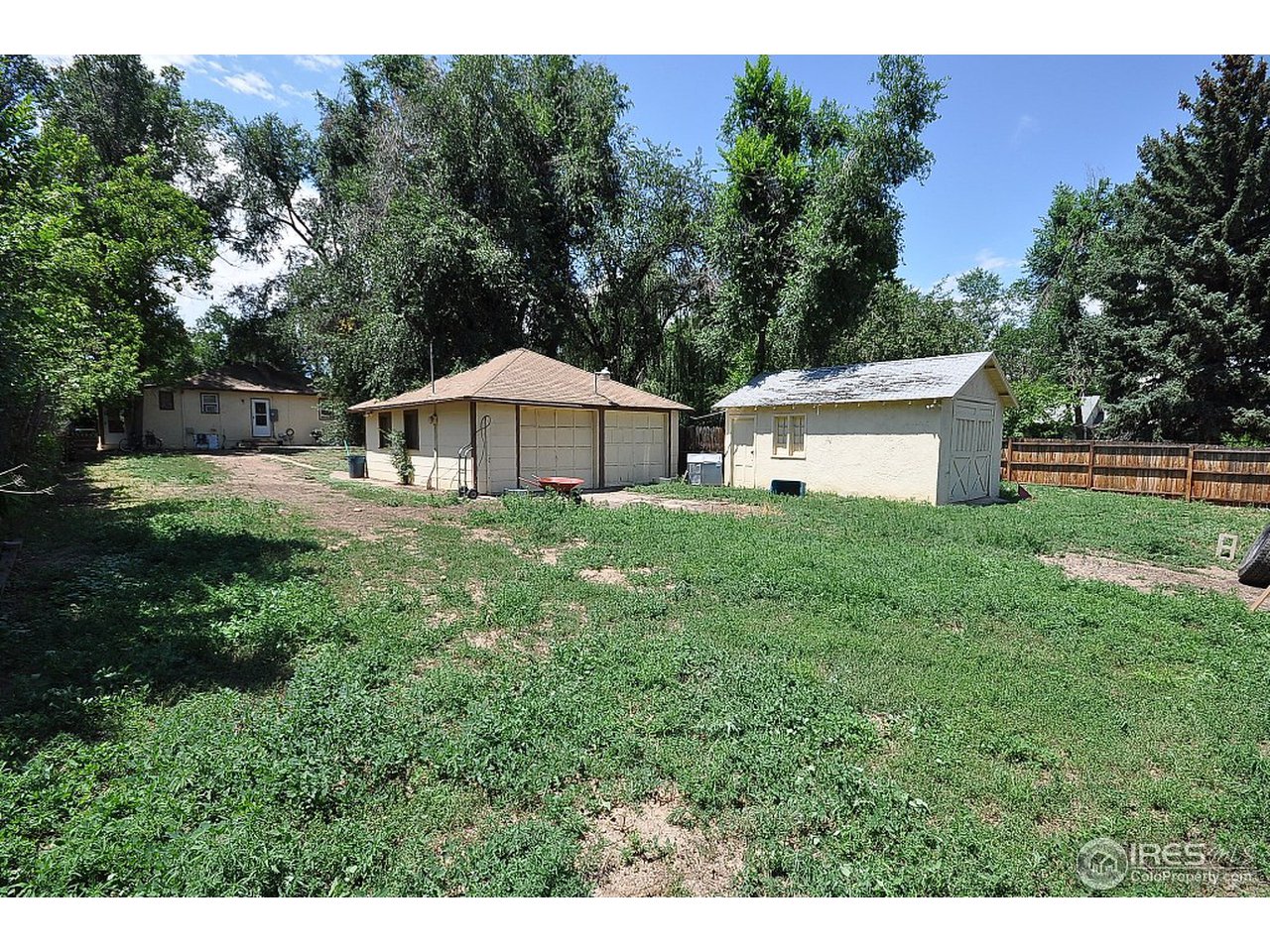 222 North Whitcomb Street Fort Collins, CO 80521 - Photo 22 of 23 a house view with a garden space