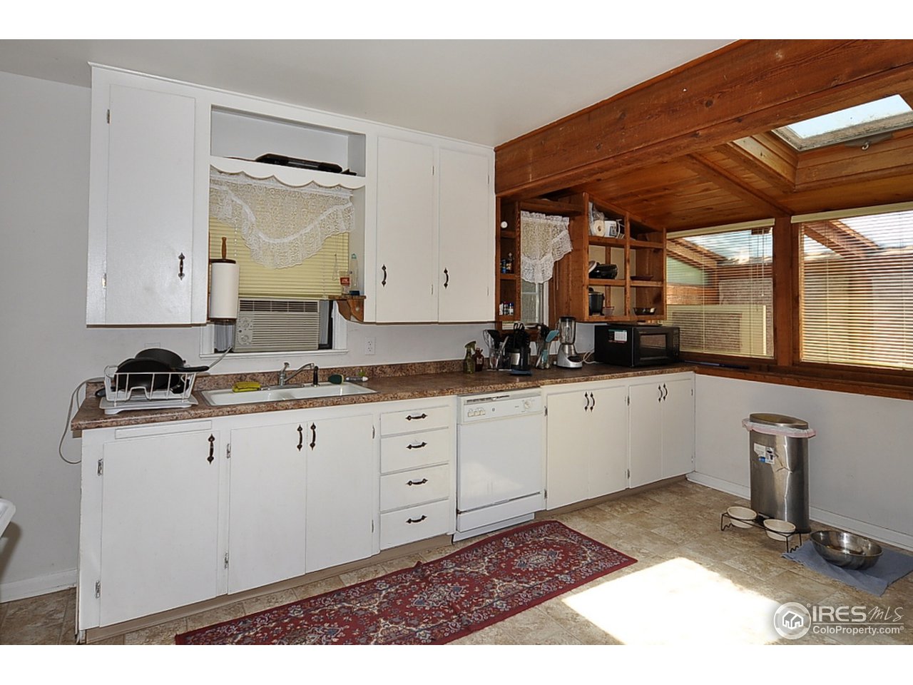 222 North Whitcomb Street Fort Collins, CO 80521 - Photo 9 of 23 a view of a sink and cabinets