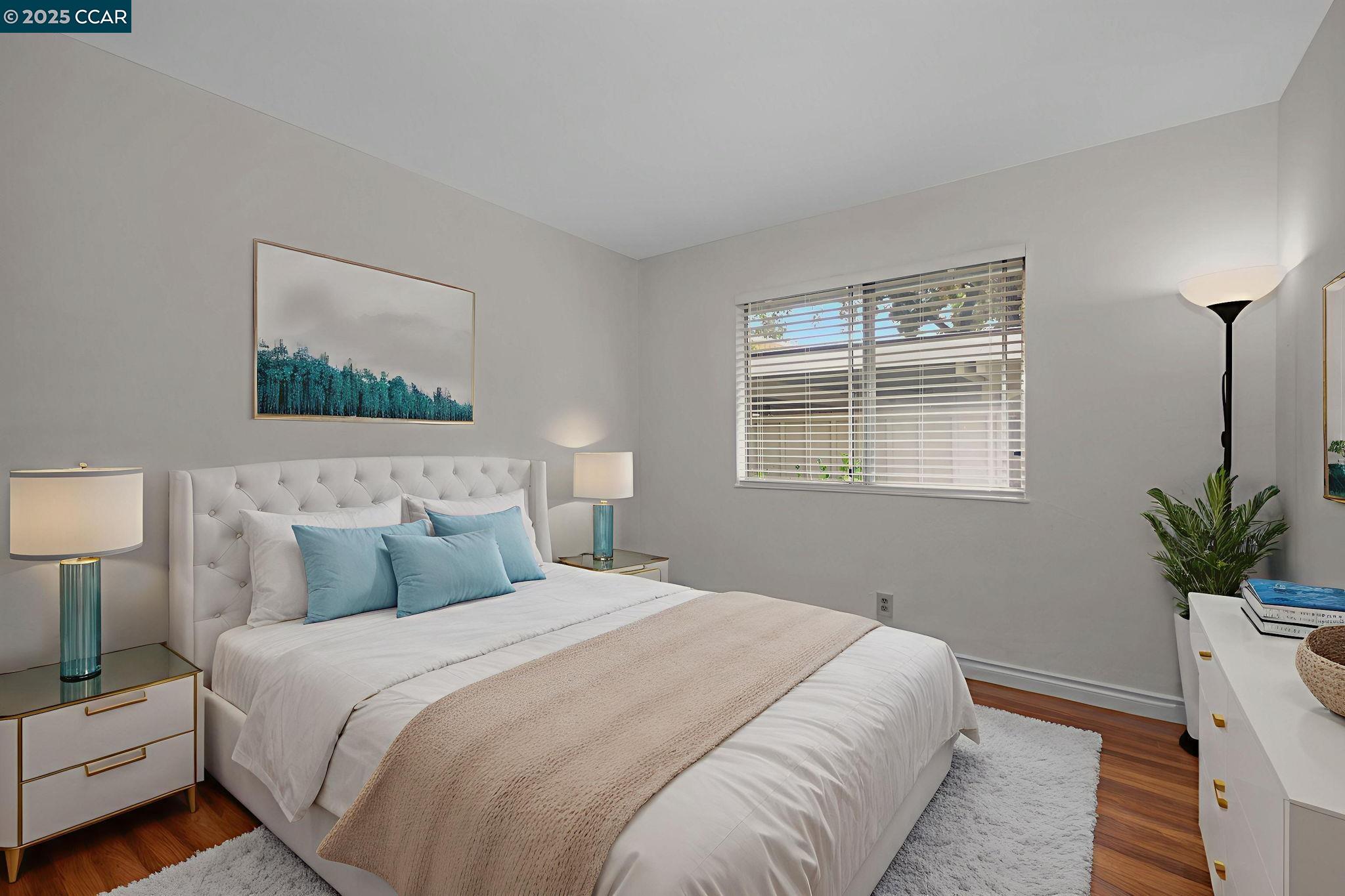 412 Carillo Court San Ramon, CA 94583 - Photo 17 of 28 a bedroom with a bed and a potted plant
