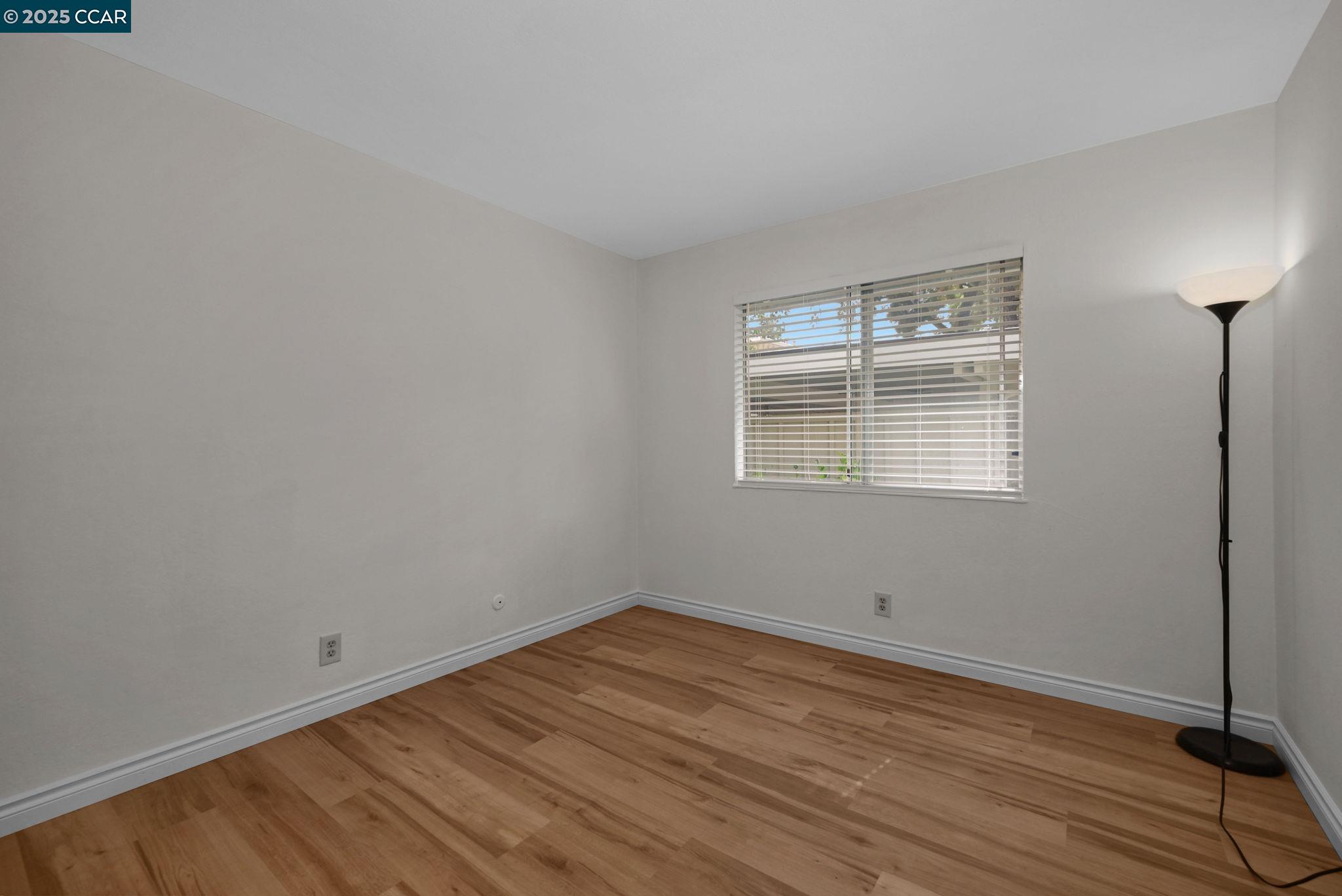 412 Carillo Court San Ramon, CA 94583 - Photo 18 of 28 a view of a room with wooden floor and windows