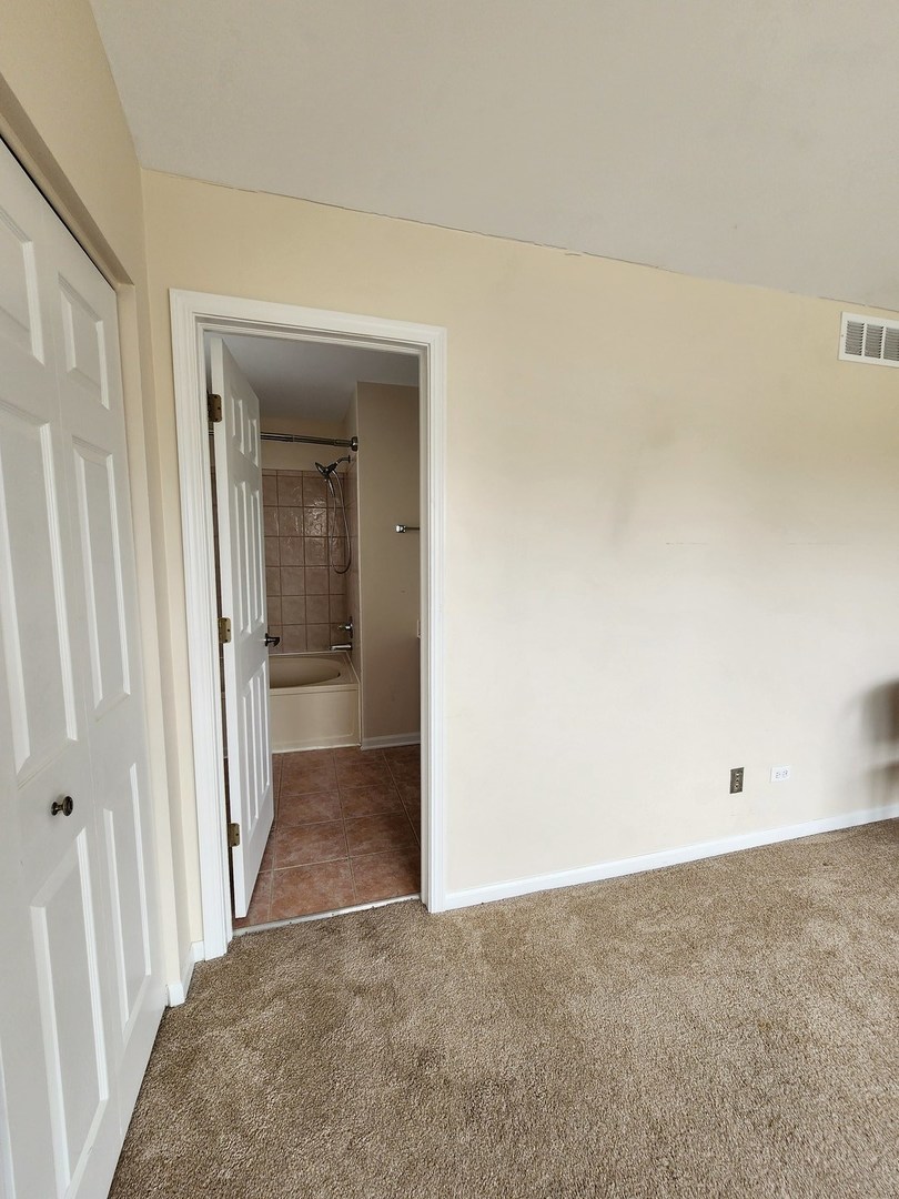 7309 Atkinson Circle Plainfield, IL 60586 - Photo 17 of 38 view of a room with an empty space