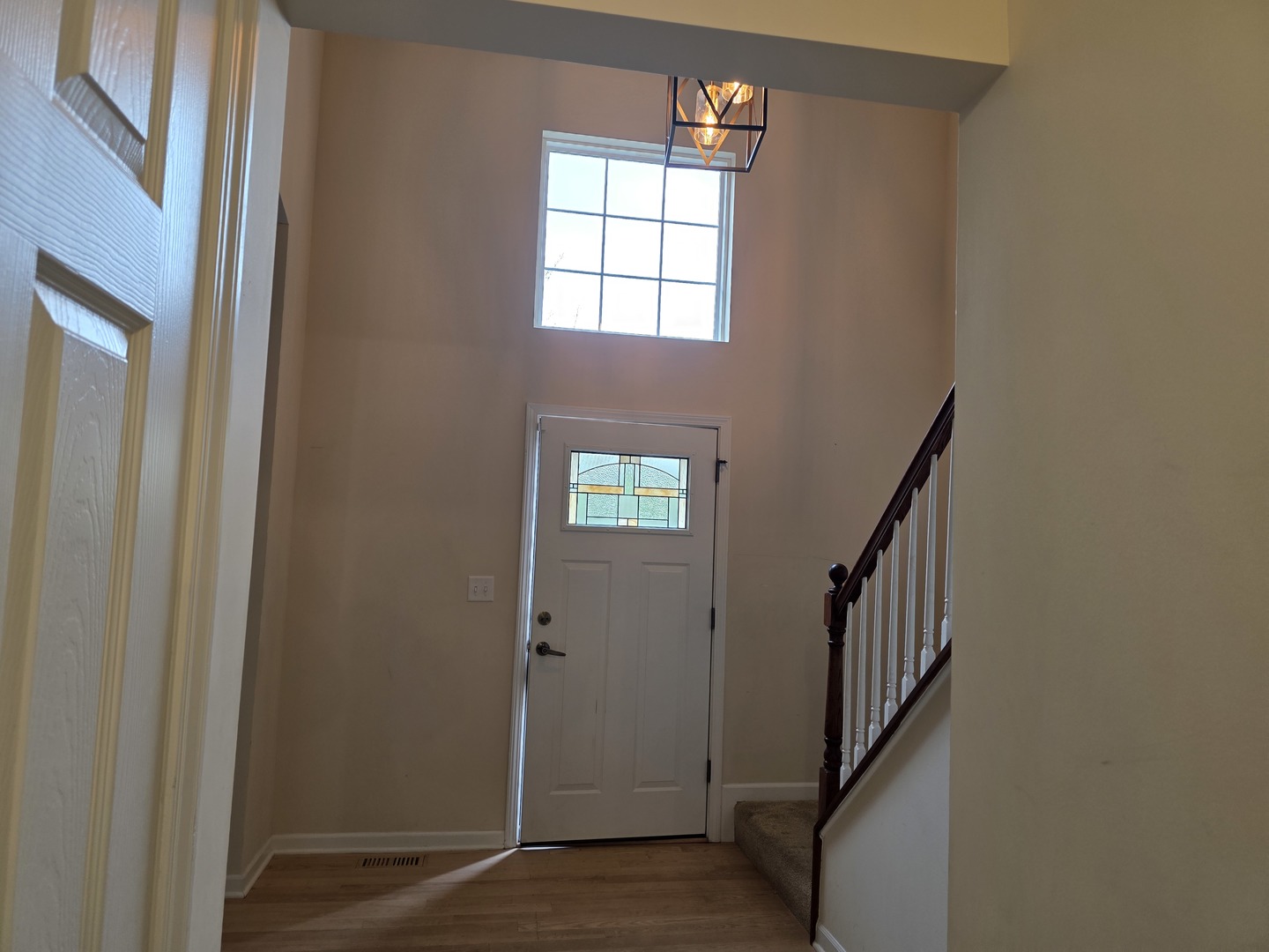 7309 Atkinson Circle Plainfield, IL 60586 - Photo 19 of 38 a view of an entryway with staircase