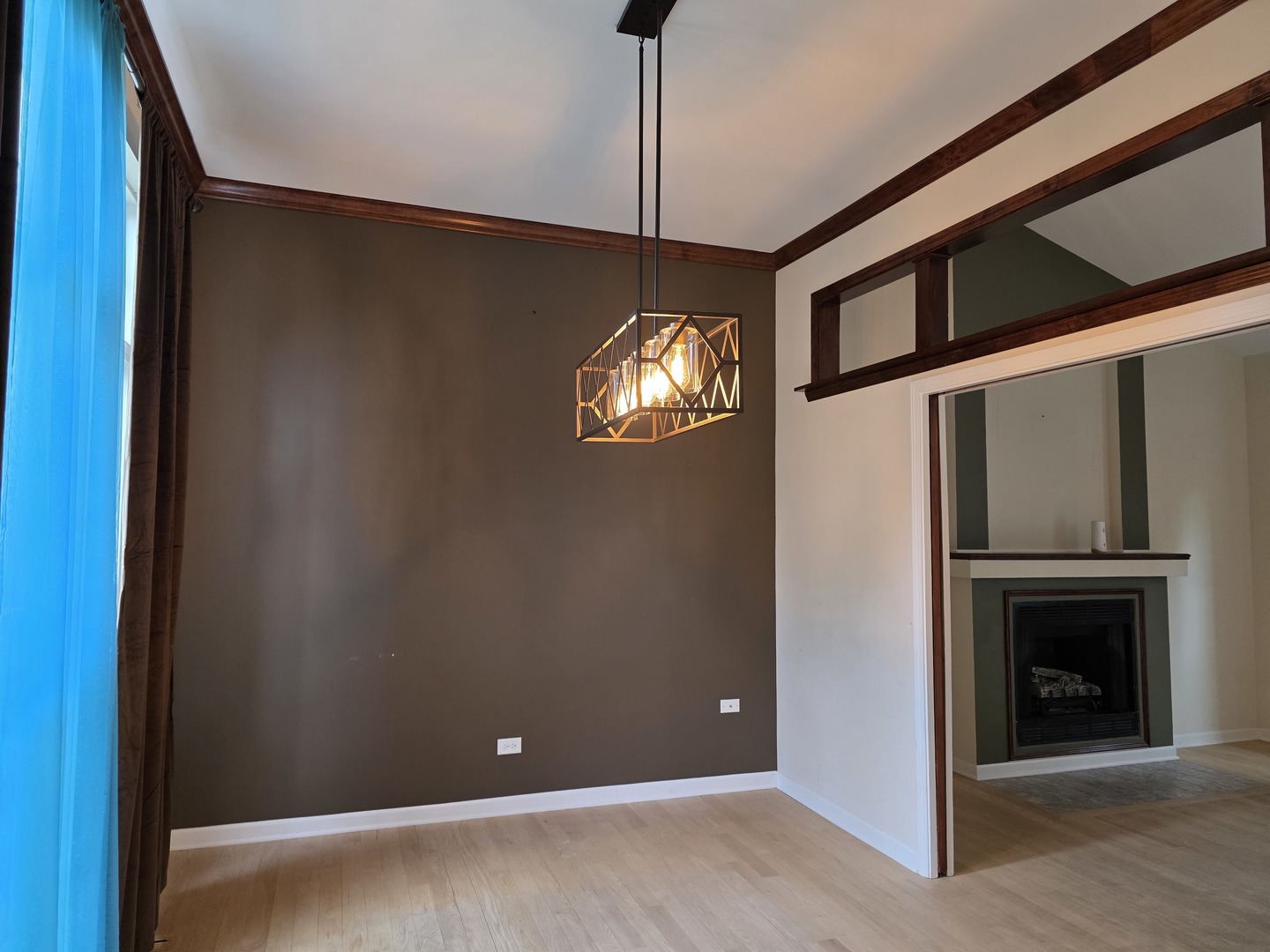 7309 Atkinson Circle Plainfield, IL 60586 - Photo 24 of 38 a view of an empty room with window and kitchen view