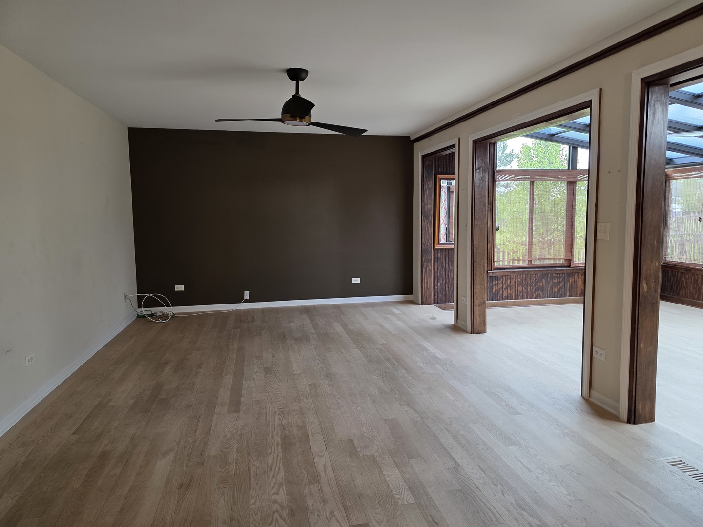 7309 Atkinson Circle Plainfield, IL 60586 - Photo 31 of 38 a view of a livingroom with wooden floor and windows