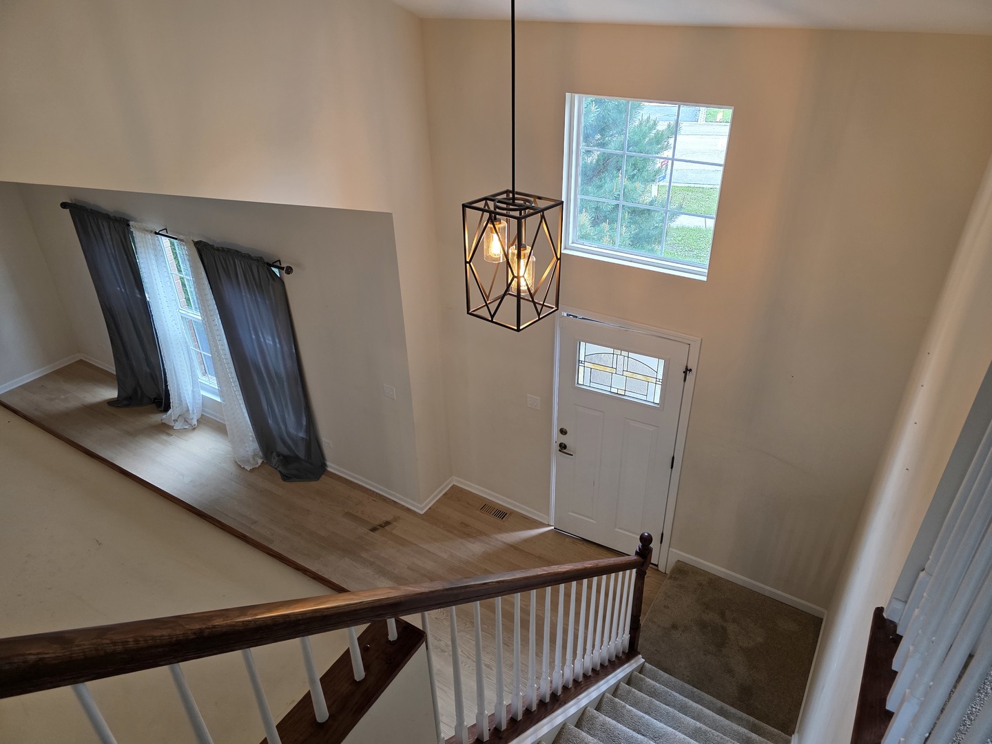 7309 Atkinson Circle Plainfield, IL 60586 - Photo 5 of 38 a view of an entryway with wooden floor