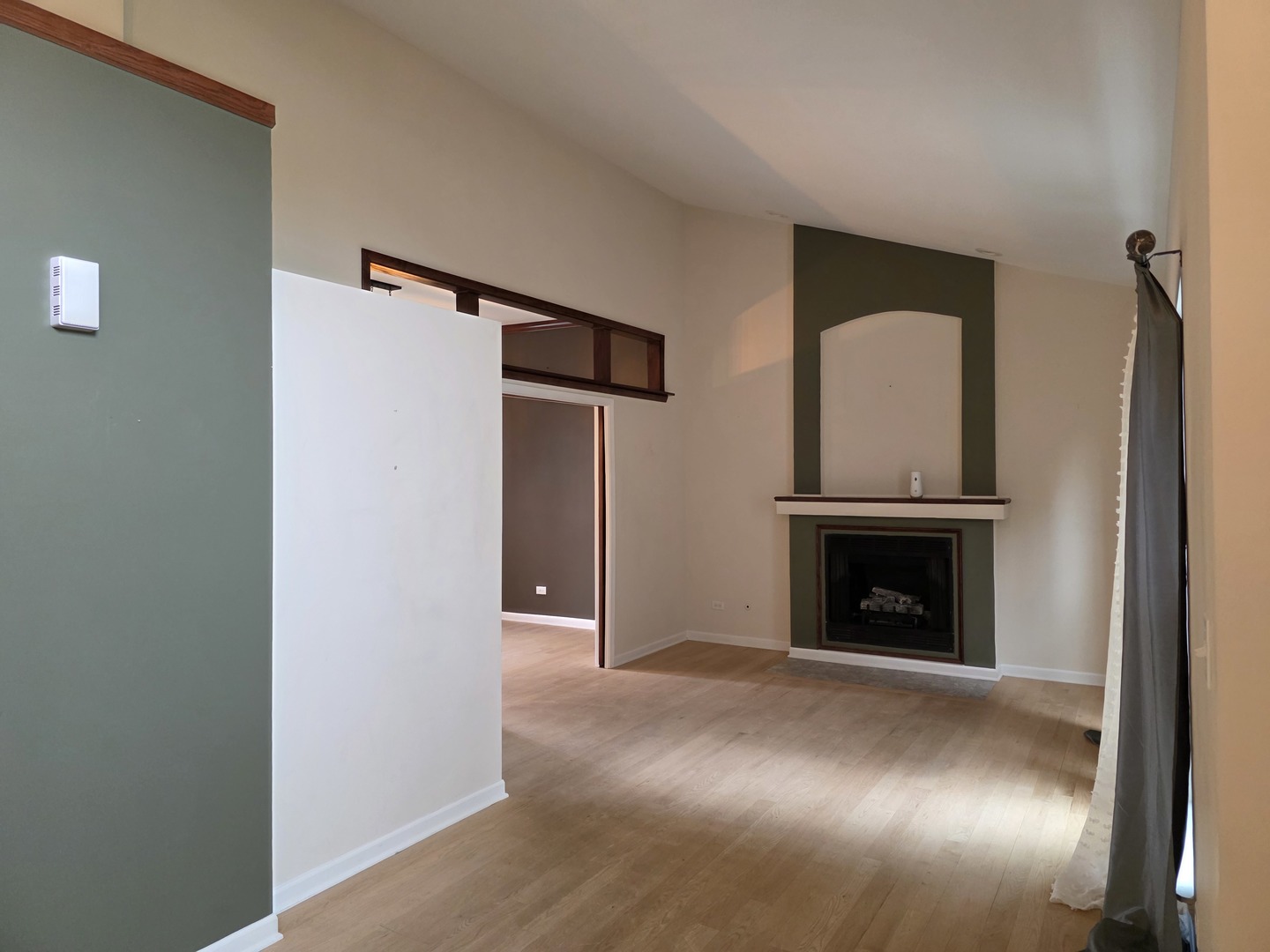 7309 Atkinson Circle Plainfield, IL 60586 - Photo 7 of 38 a view of an empty room with a fireplace