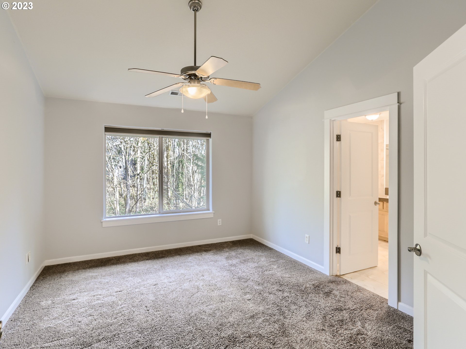 14505 Southeast Clatsop Street Portland, OR 97236 - Photo 14 of 27 a view of an empty room with a window