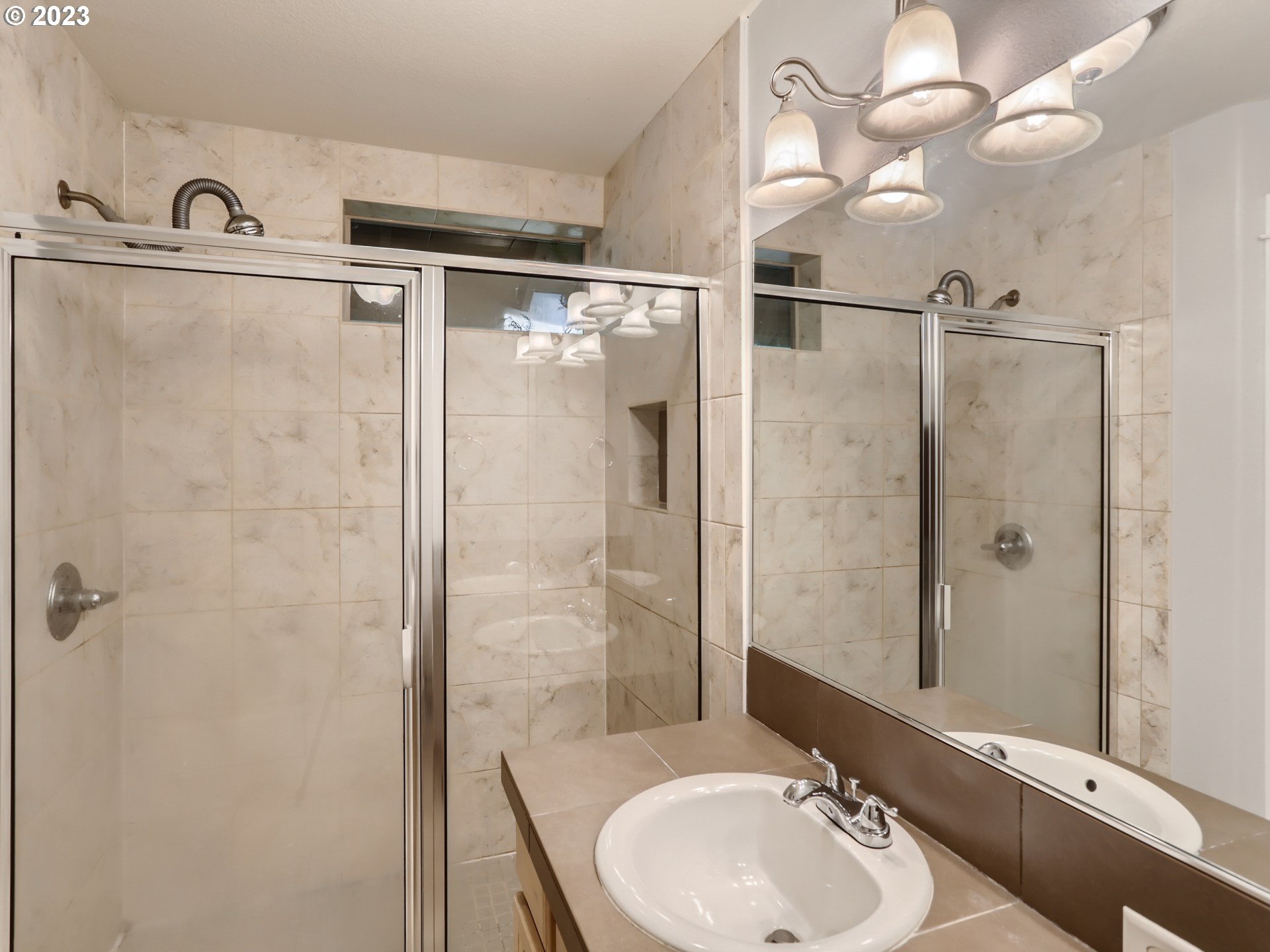 14505 Southeast Clatsop Street Portland, OR 97236 - Photo 18 of 27 a bathroom with a sink toilet and shower