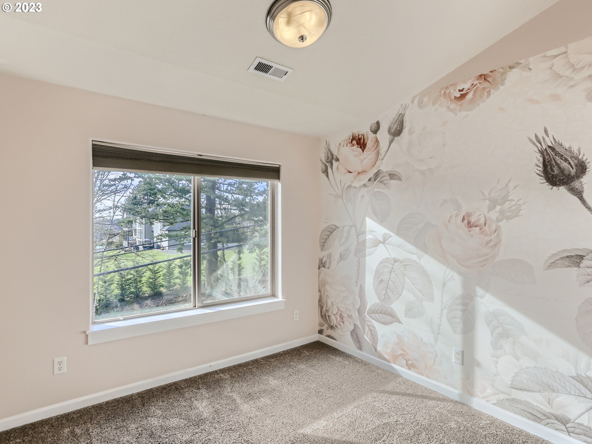 14505 Southeast Clatsop Street Portland, OR 97236 - Photo 22 of 27 a view of an empty room with a window