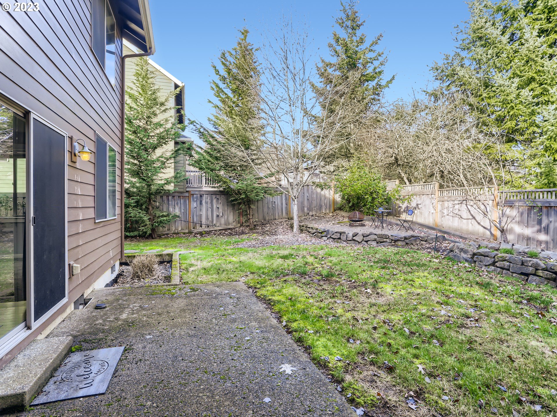 14505 Southeast Clatsop Street Portland, OR 97236 - Photo 25 of 27 a view of a backyard with a garden