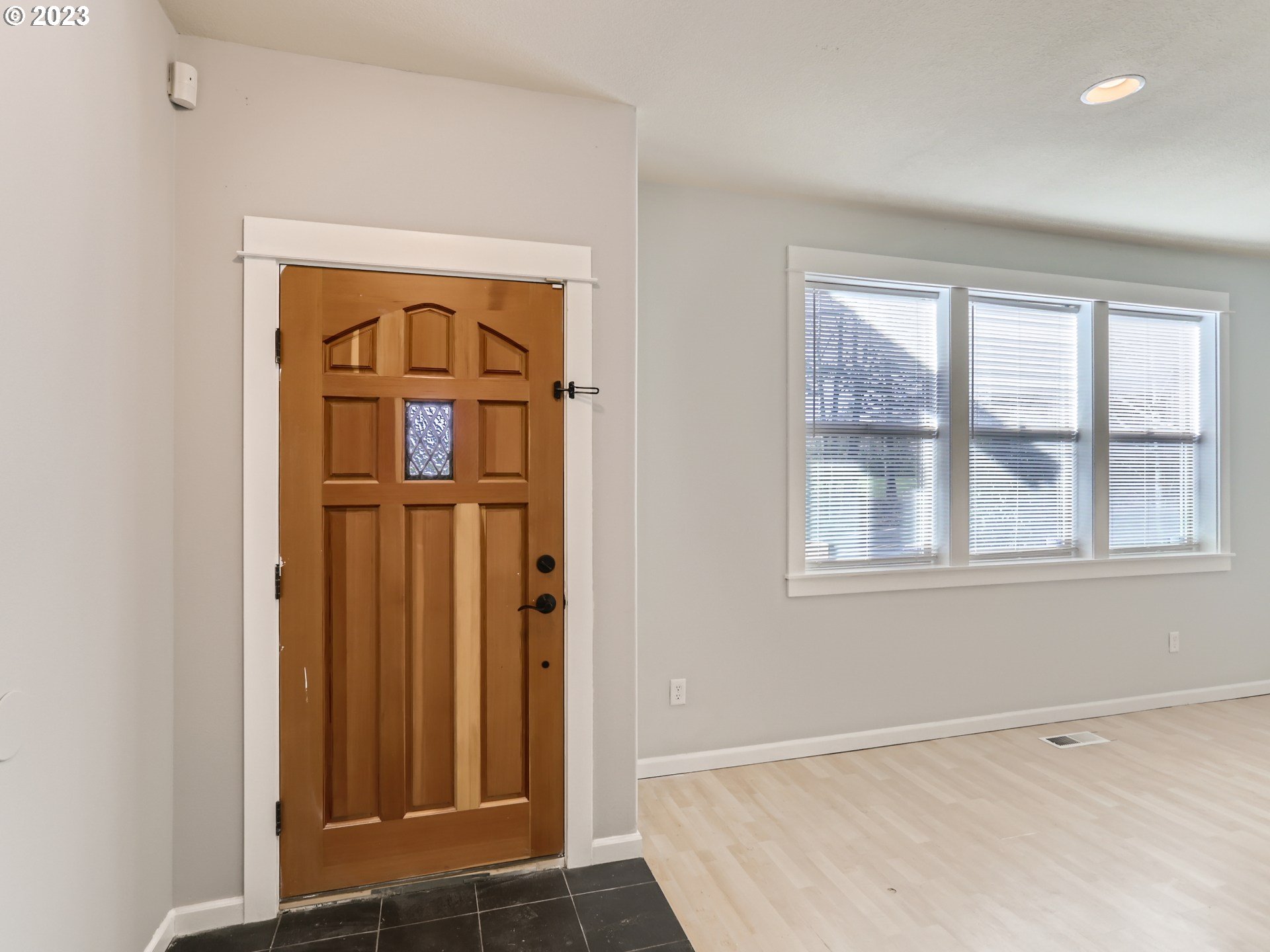 14505 Southeast Clatsop Street Portland, OR 97236 - Photo 4 of 27 an empty room with windows