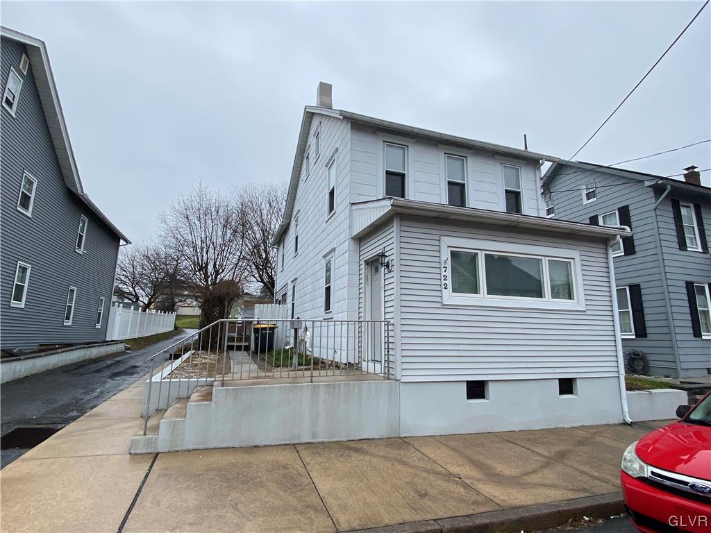 a view of a house with a patio