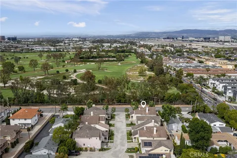 an aerial view of a city with lots of residential buildings