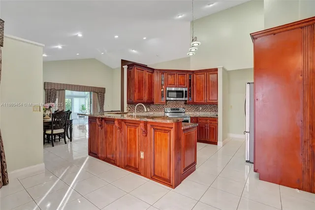 a view of a lake with houses in the back
