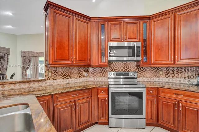 $699,000 | 1485 Lacosta Drive West, Pembroke Pines, FL 33027