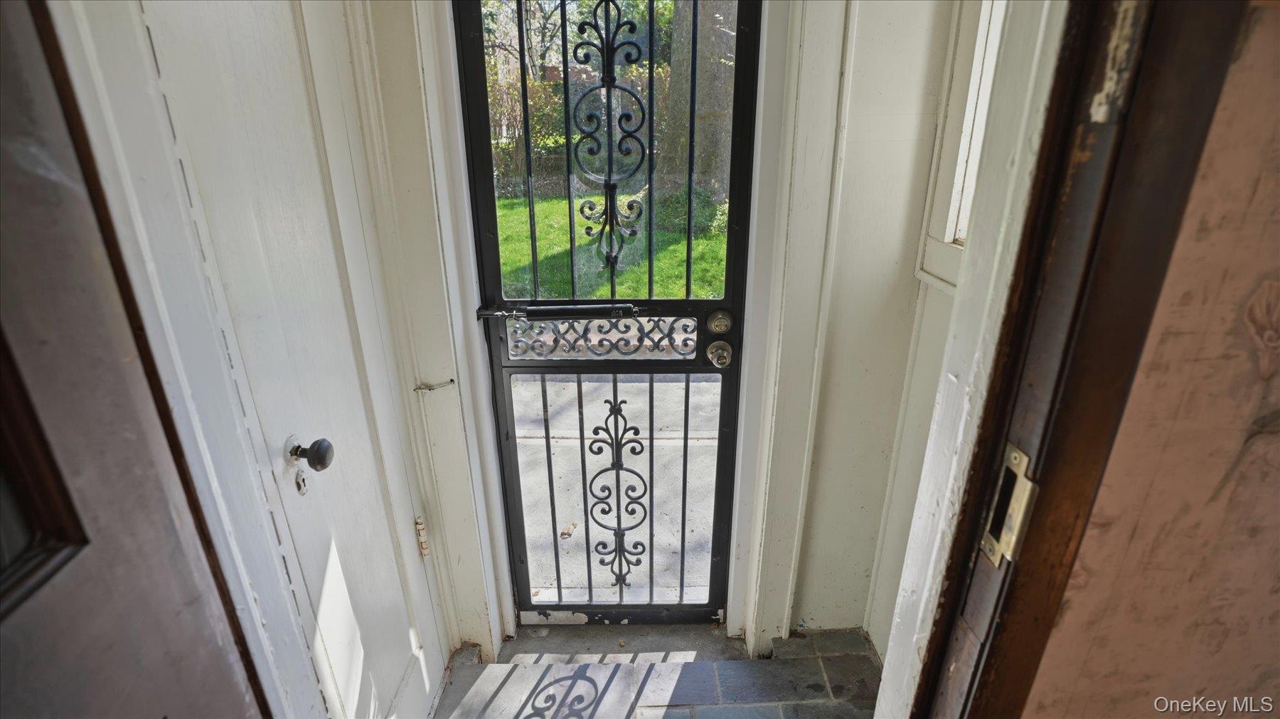 641 158th Street Queens, NY 11357 - Photo 18 of 37 a view of front door