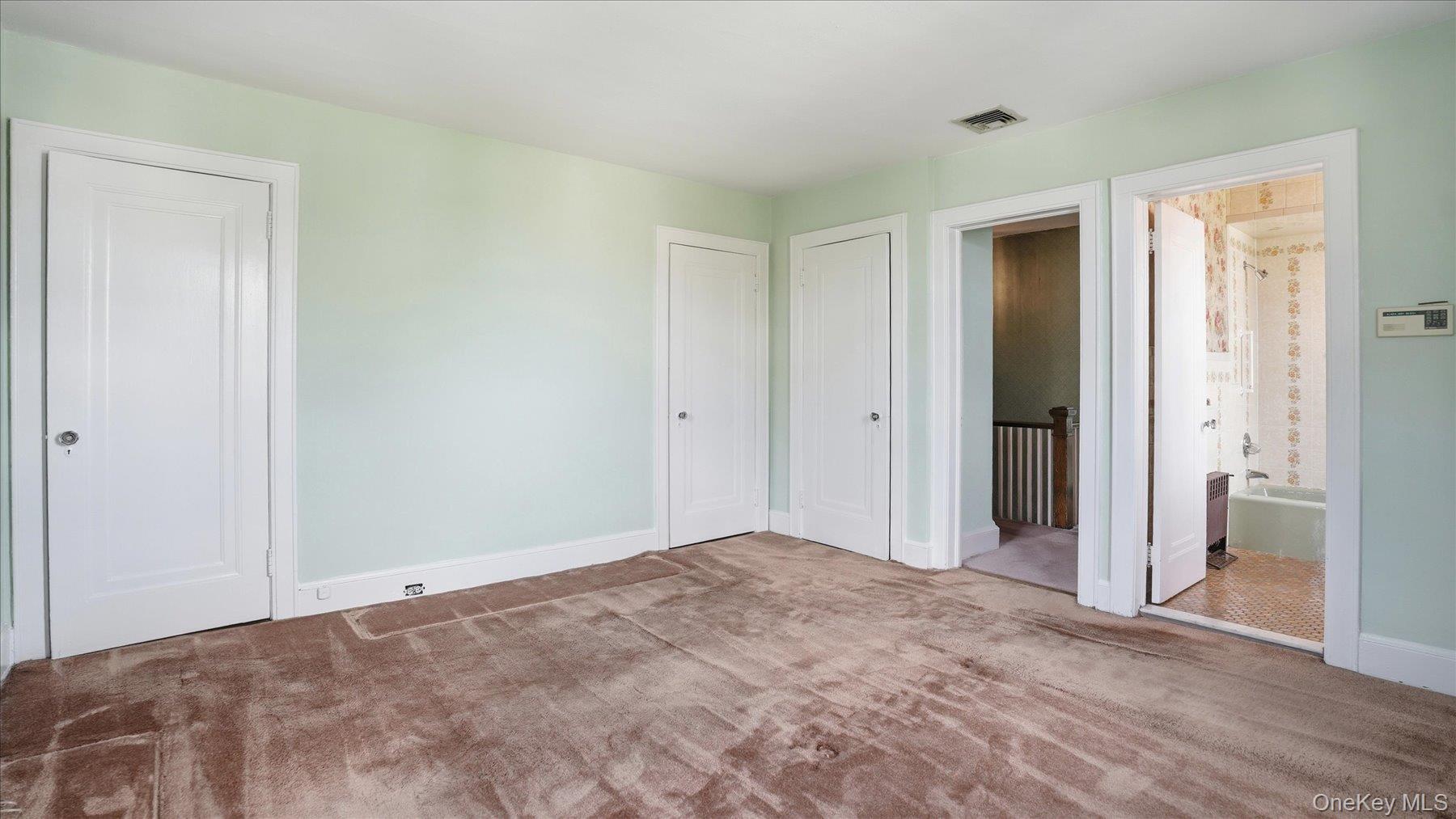 641 158th Street Queens, NY 11357 - Photo 20 of 37 Primary en suite bedroom