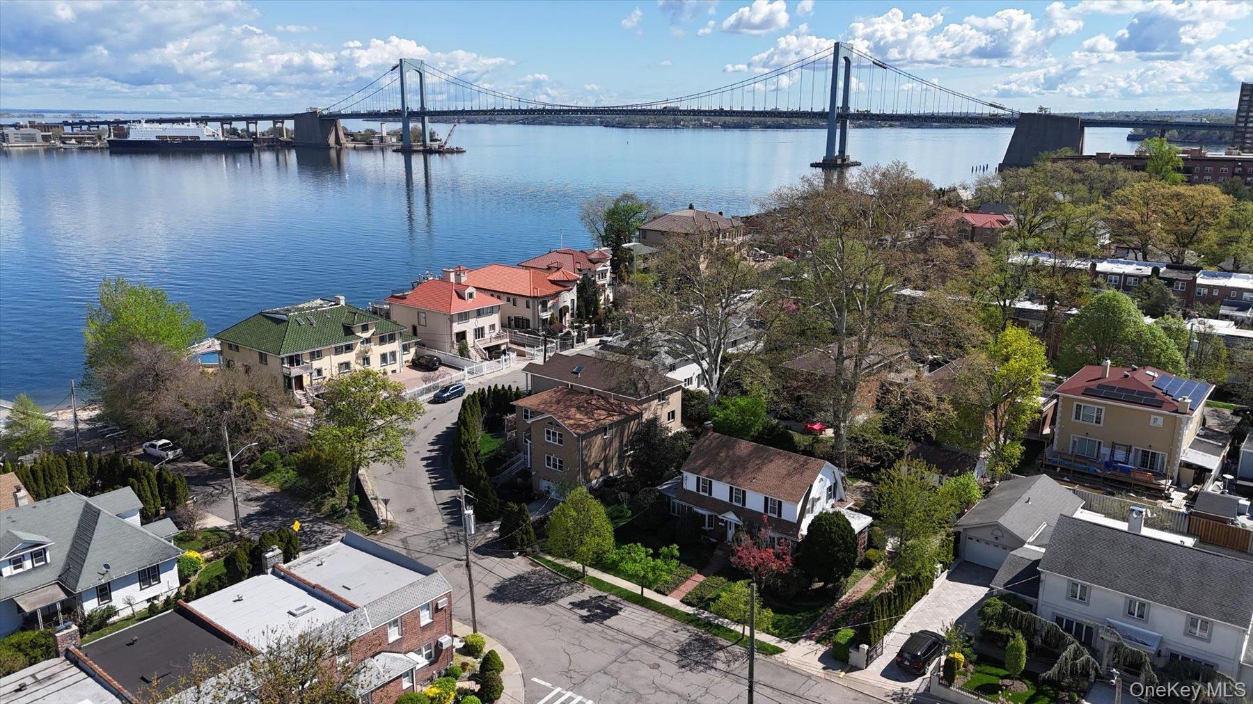 641 158th Street Queens, NY 11357 - Photo 27 of 37 an aerial view of a house with a lake view