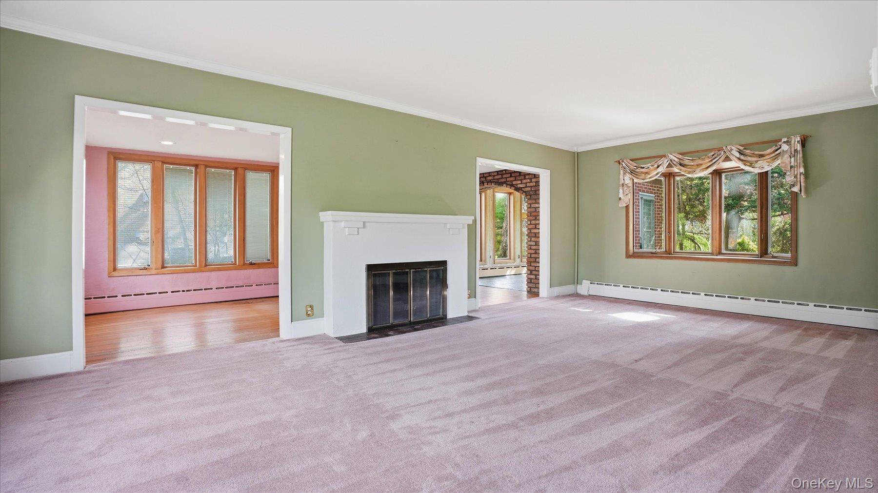 641 158th Street Queens, NY 11357 - Photo 7 of 37 a view of empty room with a fireplace